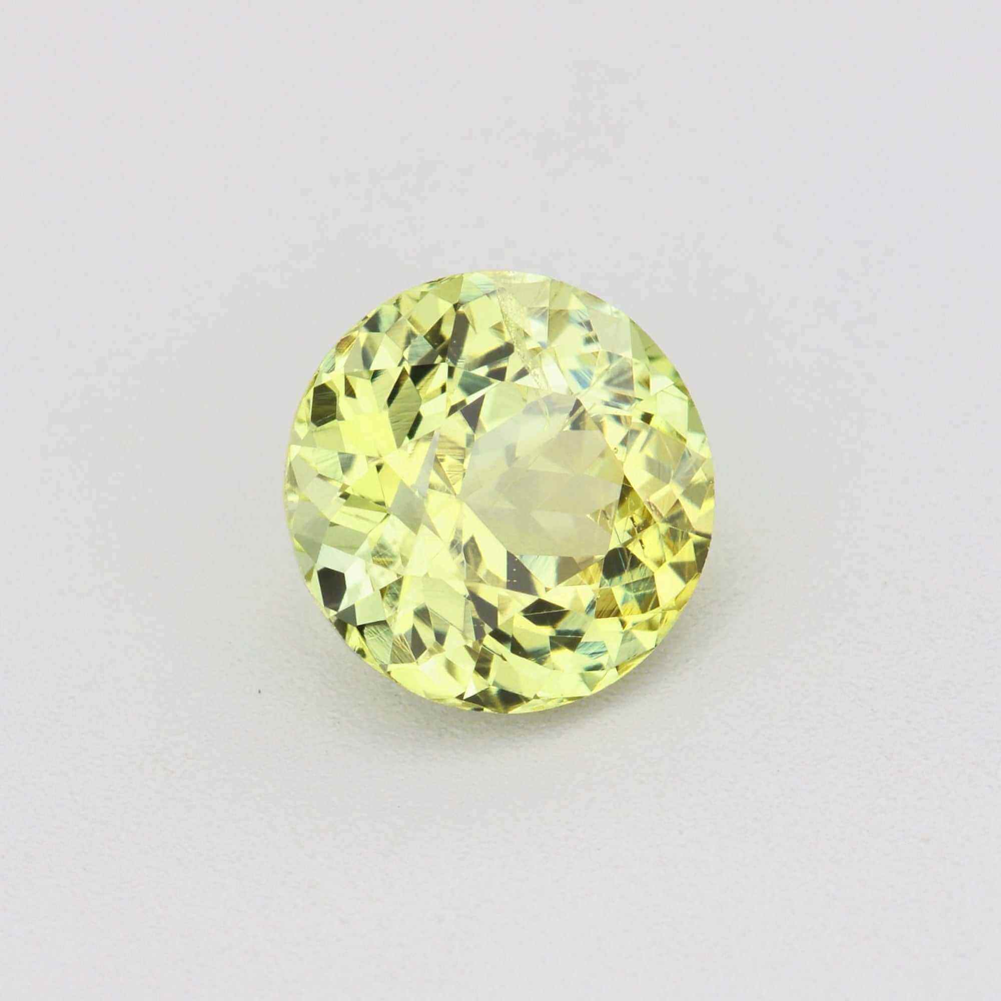 Luxury Gemstones at Fair Prices gemstones including sapphires, chrysoberyls, spinels, and garnets displayed with Crescent Gems branding