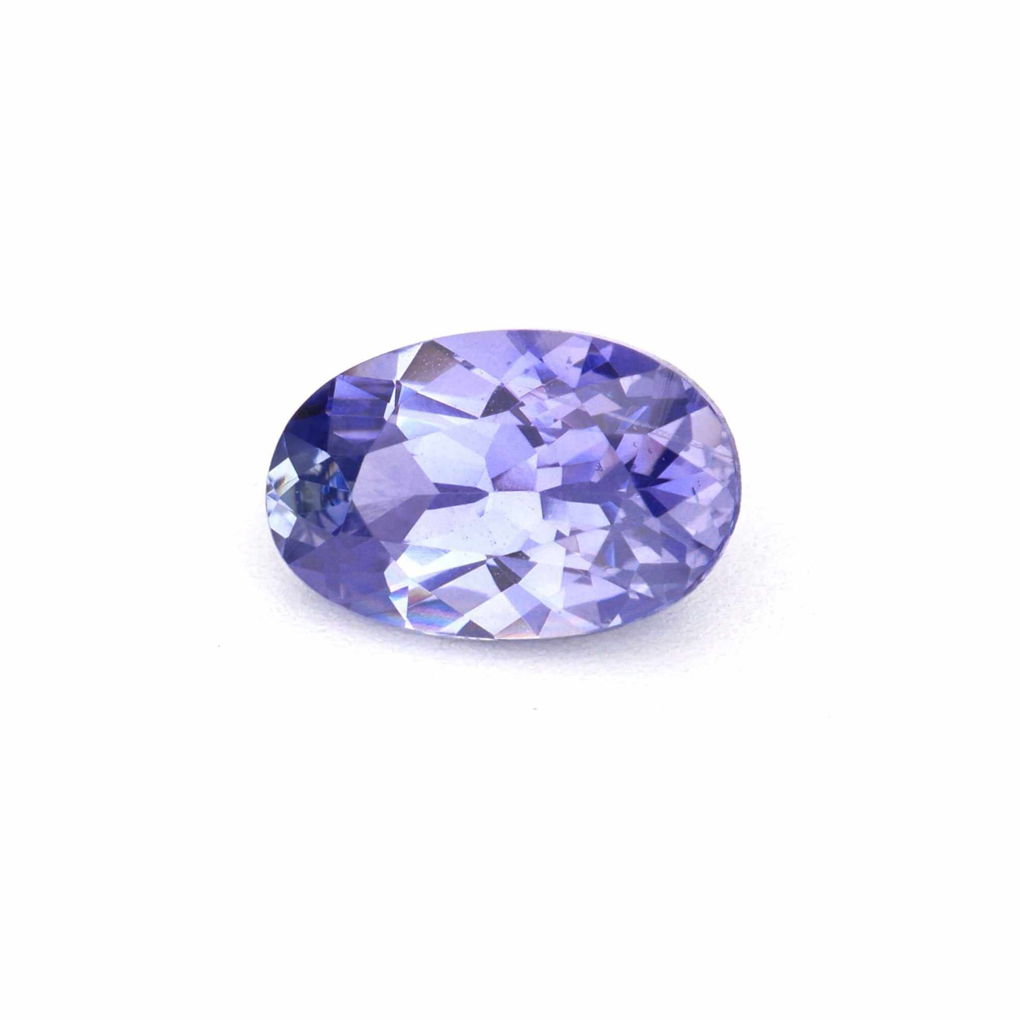 Close-up of a rare Loose Purple Sapphires gemstone showcasing its royal and mysterious deep violet hue