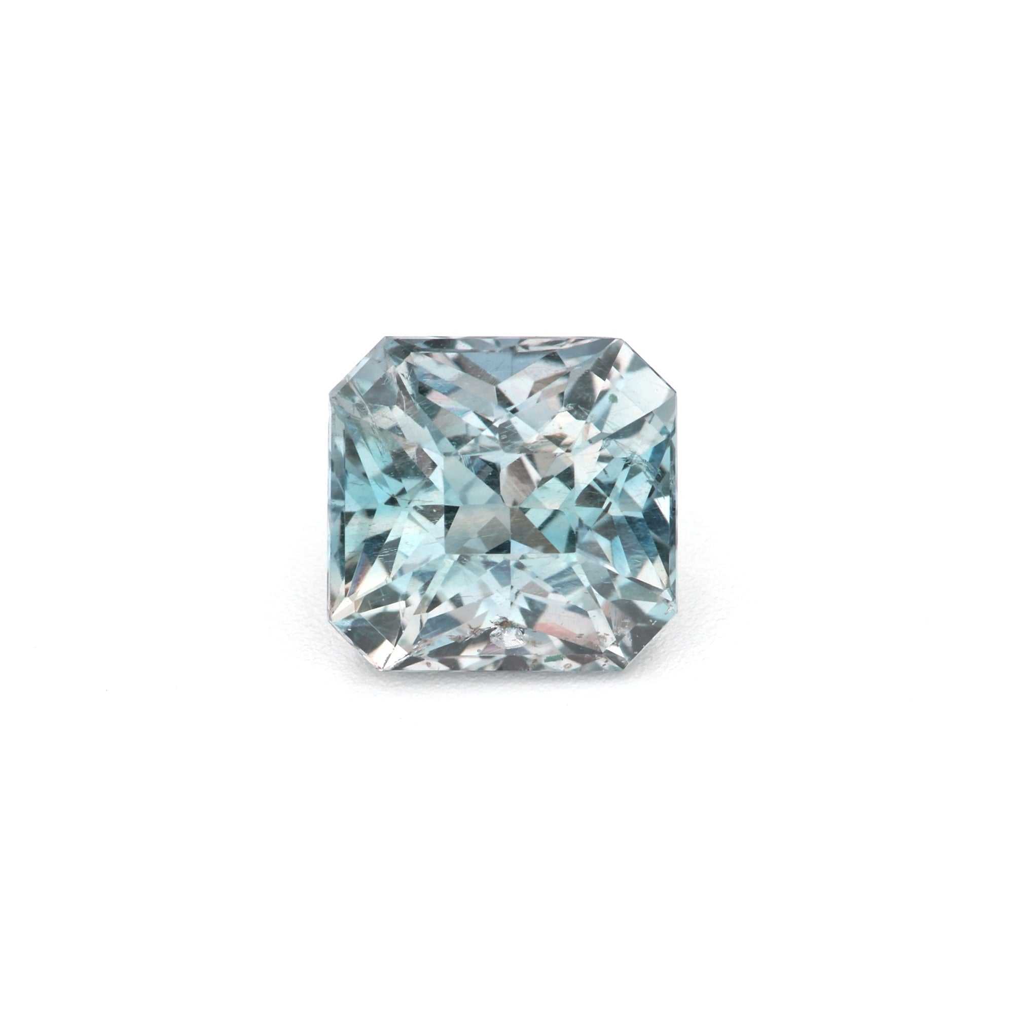1.29 ct unheated teal green sapphire with square octagon cut and brilliant facets showcasing vivid color and excellent clarity