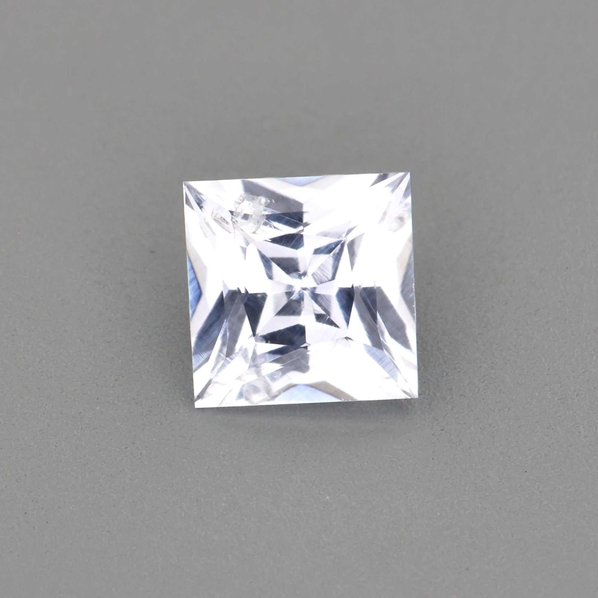 0.33 ct natural white sapphire gemstone with brilliant sparkle and diamond-like clarity