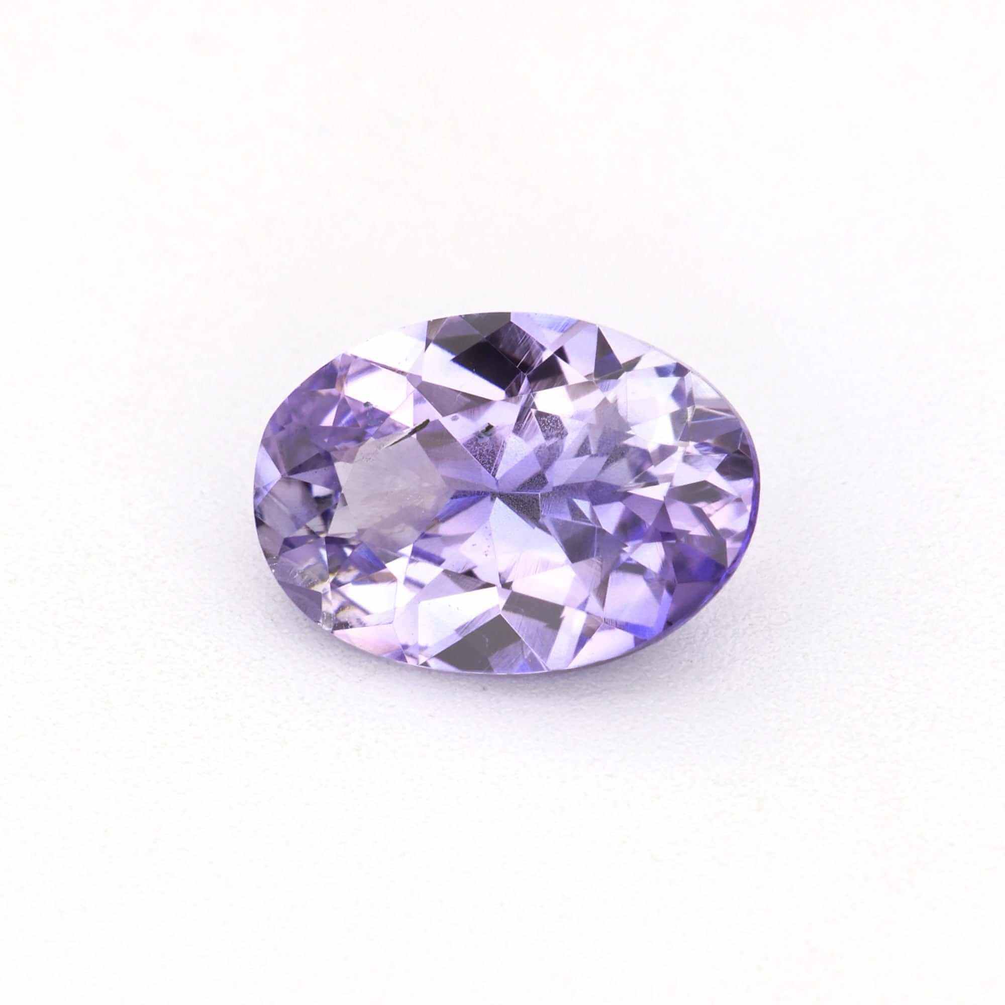 0.83 ct unheated violet sapphire gemstone with deep purple color and excellent clarity