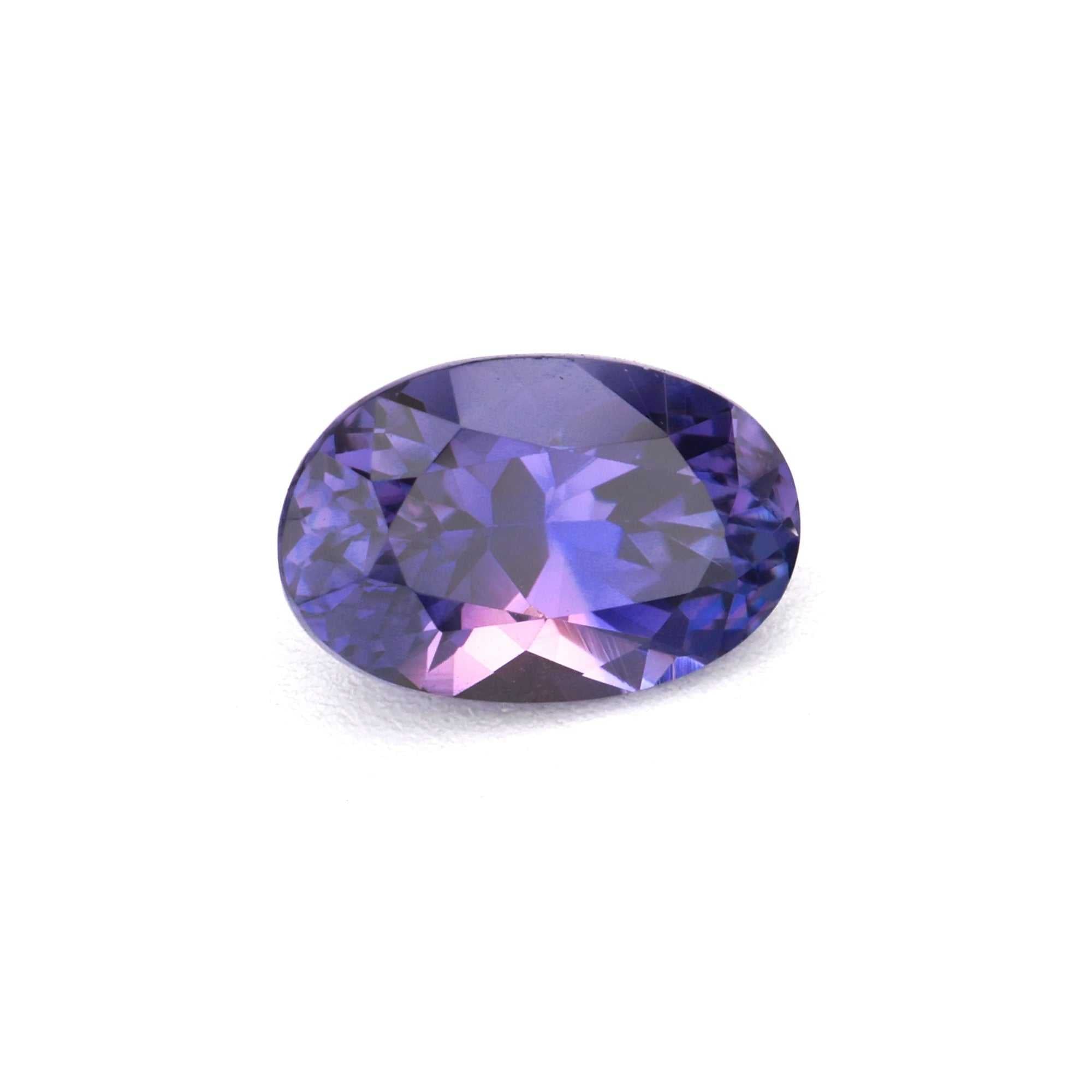 0.59 carat untreated natural violet sapphire gemstone with excellent clarity and vibrant purple hue