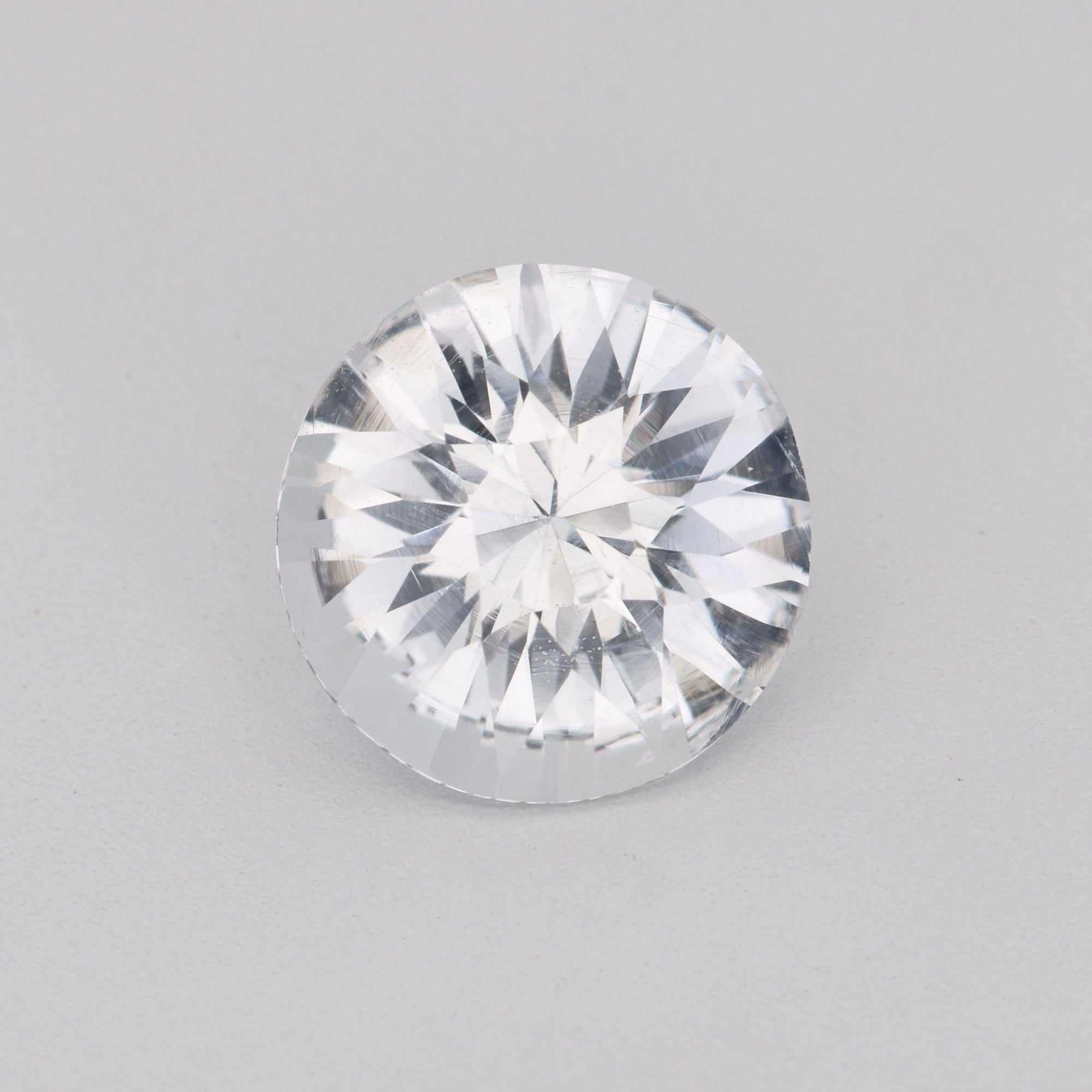 1.42 ct white round sapphire gemstone with brilliant cut and high clarity