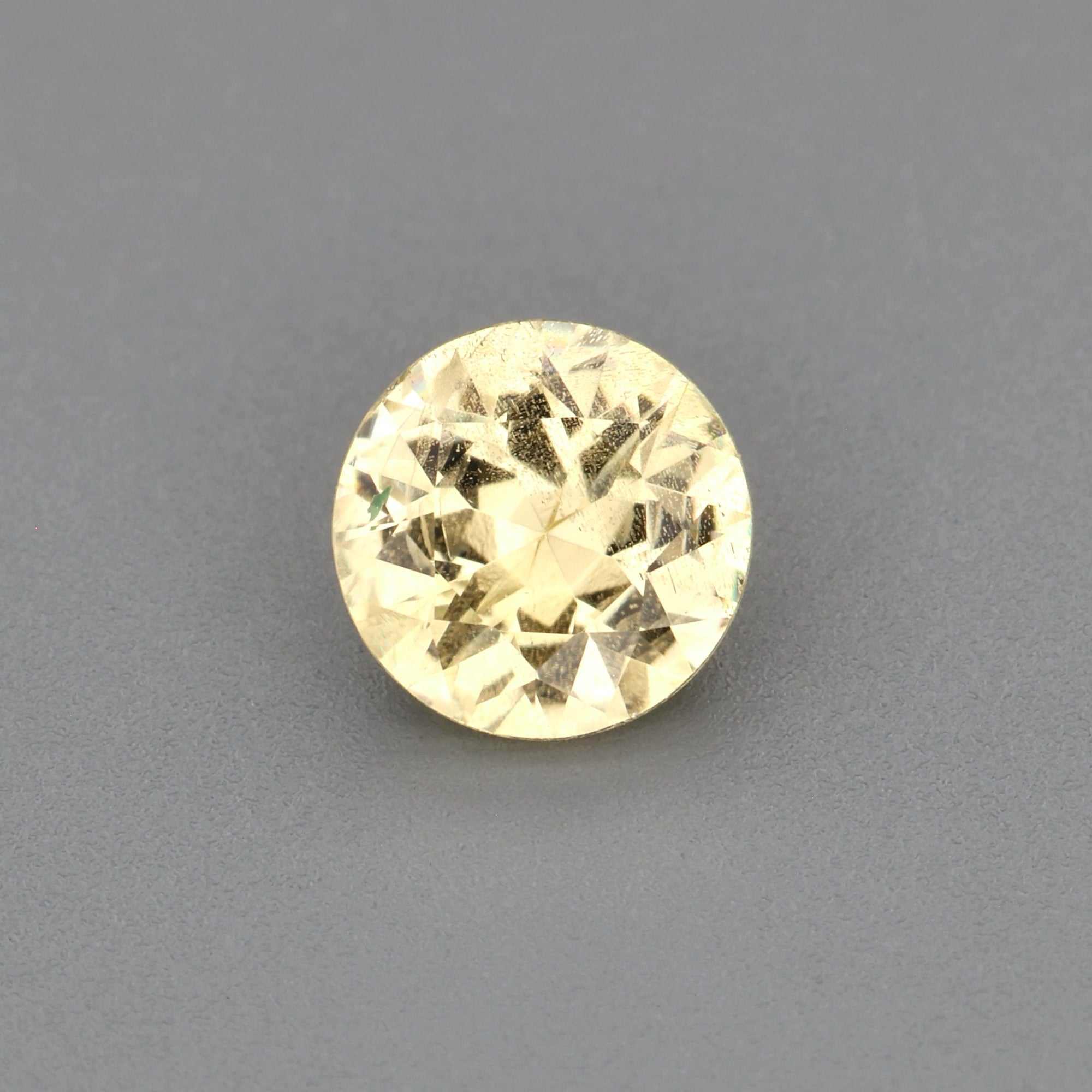 0.43 ct natural untreated yellow sapphire gemstone with vibrant golden hues and excellent clarity