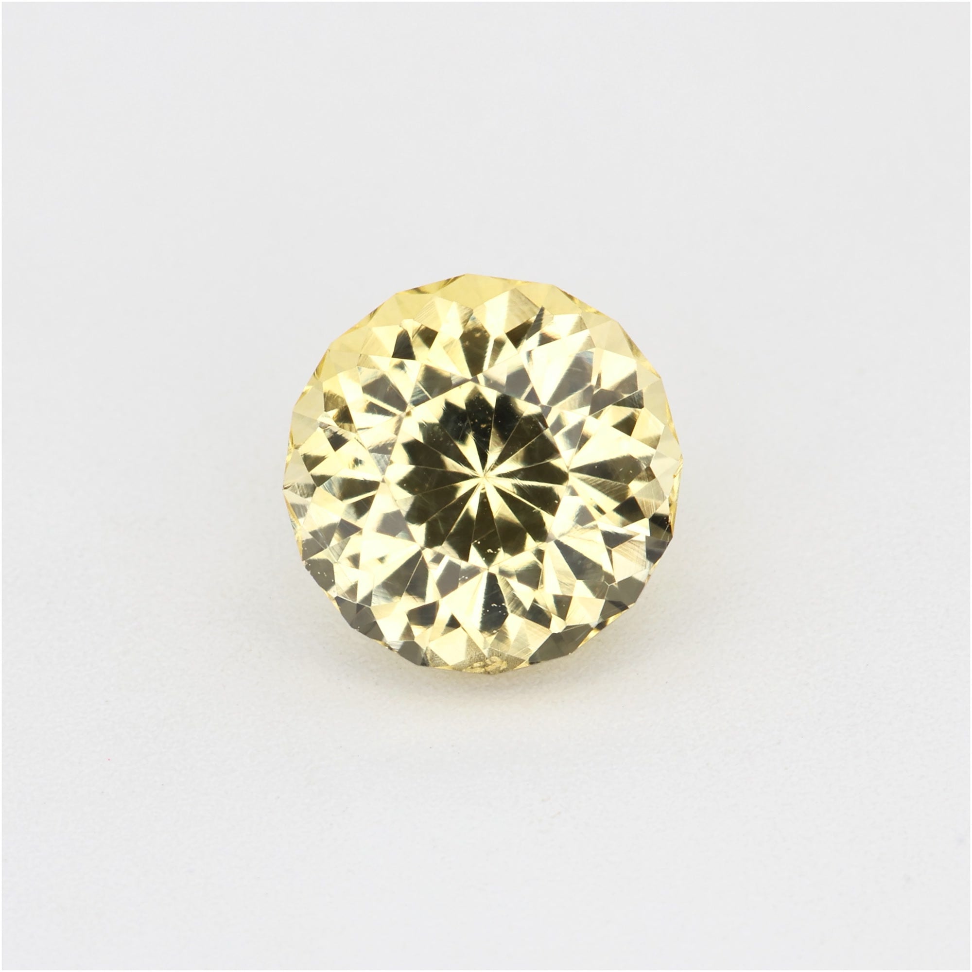1.07 ct natural untreated yellow sapphire gemstone with golden hue and excellent clarity