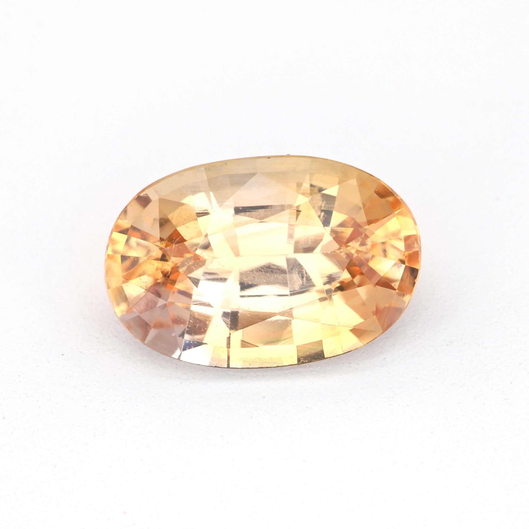 1.18ct natural unheated peach sapphire gemstone with brilliant clarity and warm peach hue