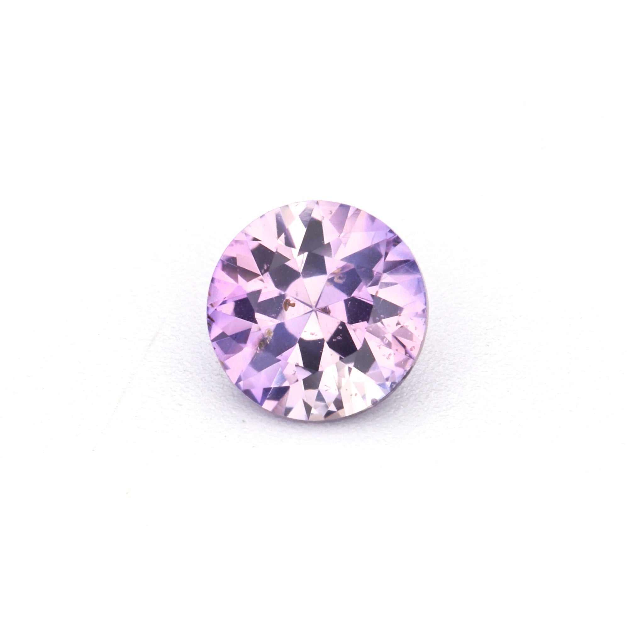 0.34 ct unheated natural violet sapphire gemstone with rich purple hue and excellent clarity