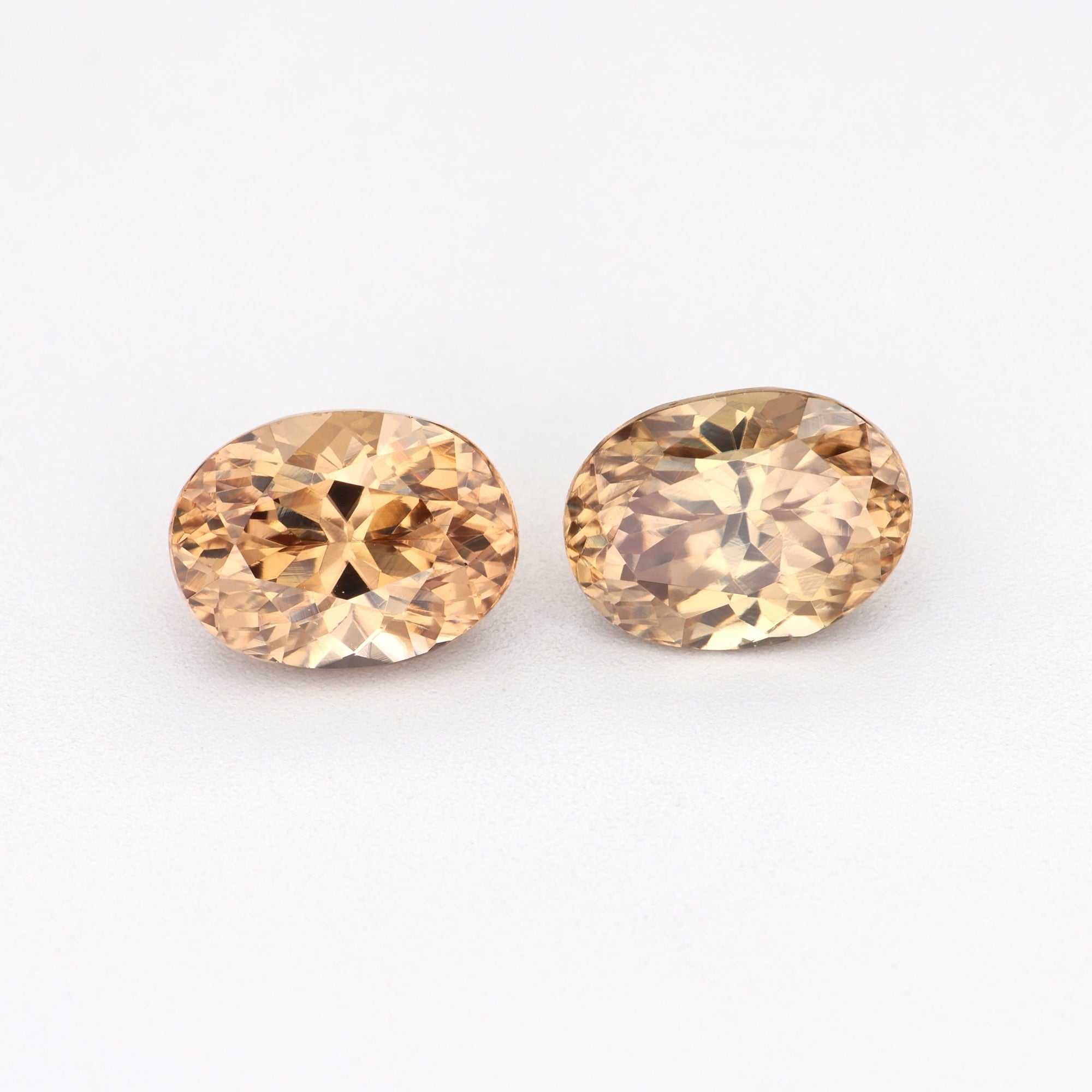 2.24 ct natural brown zircon pair showcasing golden brown color and brilliant clarity for custom jewelry designs