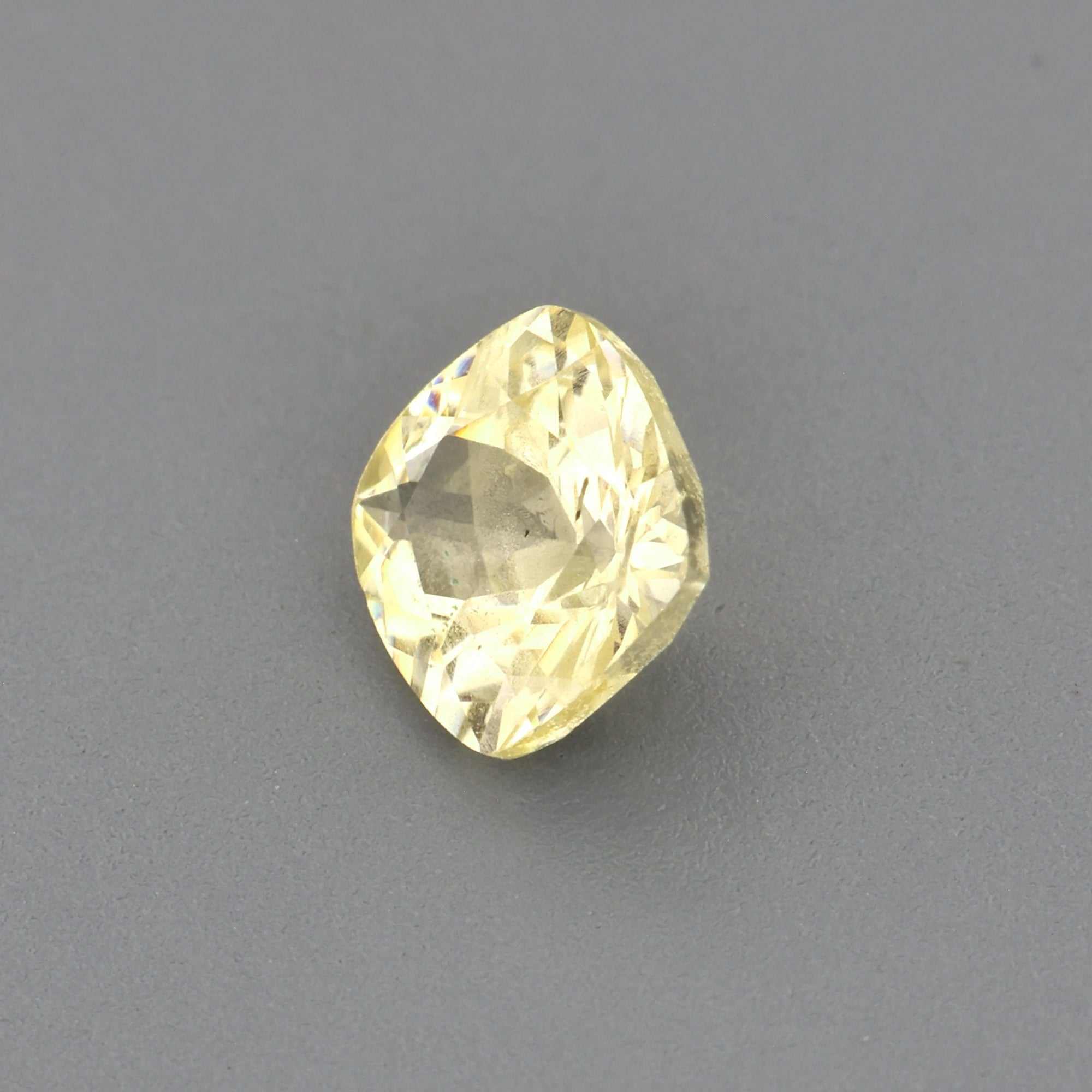 0.36 ct unheated natural yellow sapphire gemstone with golden hue and excellent clarity