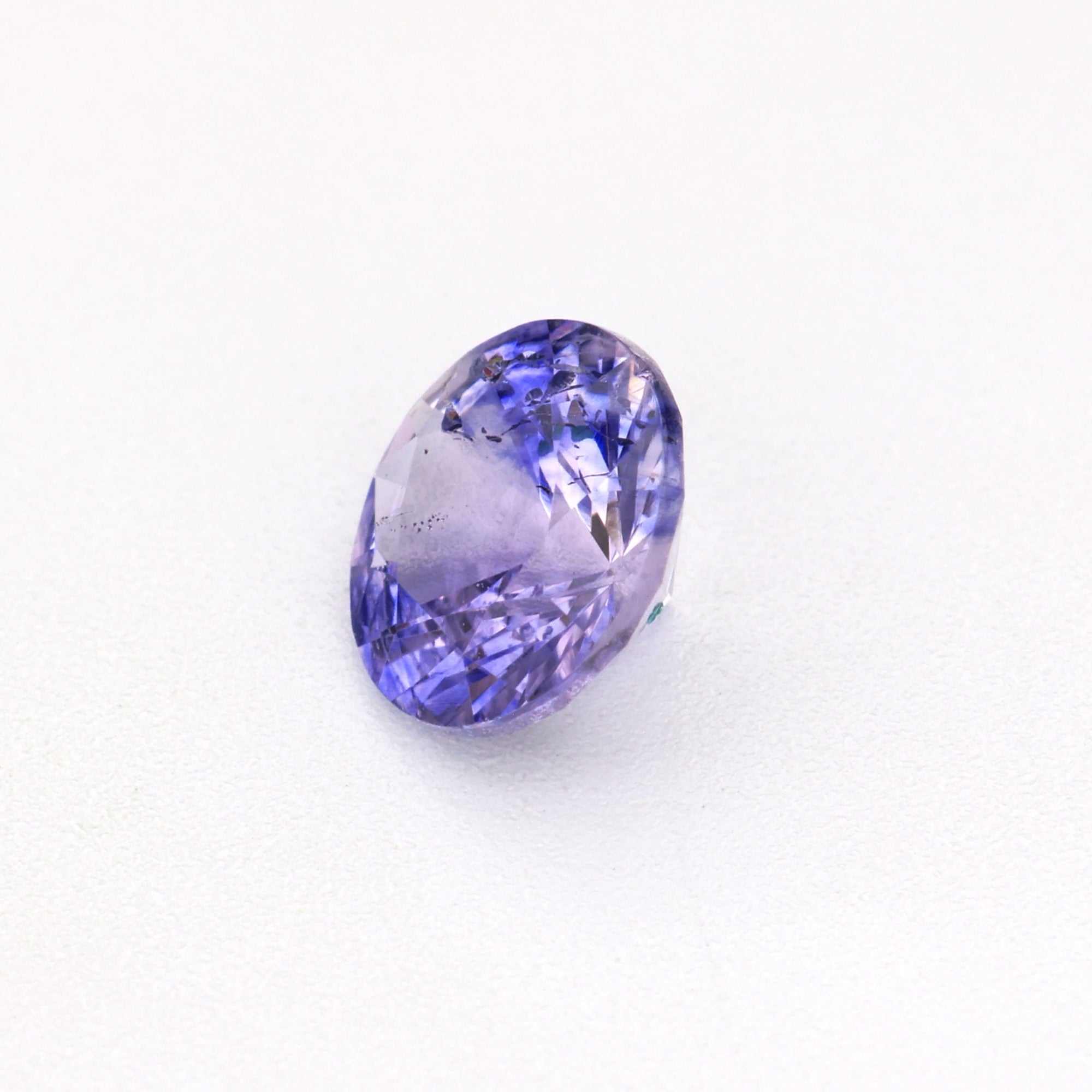 0.44 carat unheated violet sapphire gemstone with rich purple color and excellent clarity