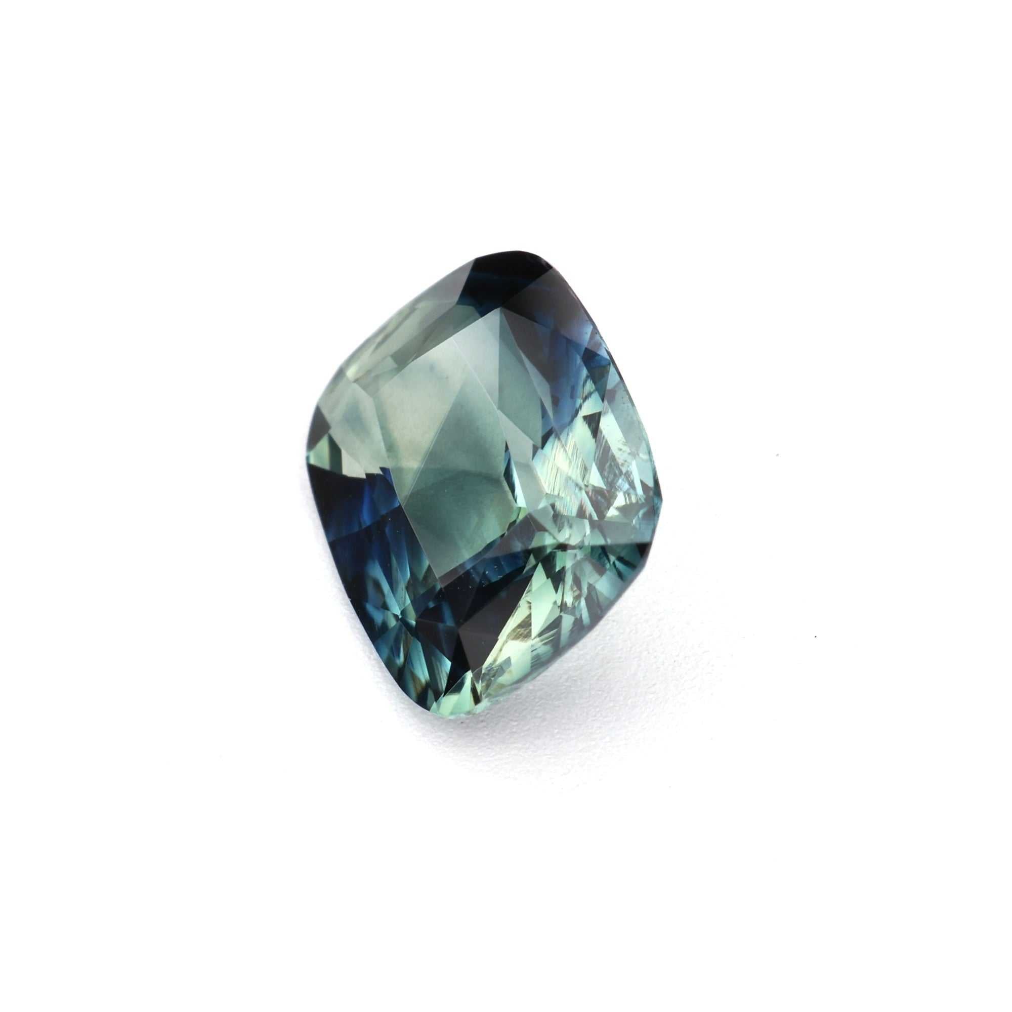 1.30 ct cushion teal sapphire showing clarity and natural color