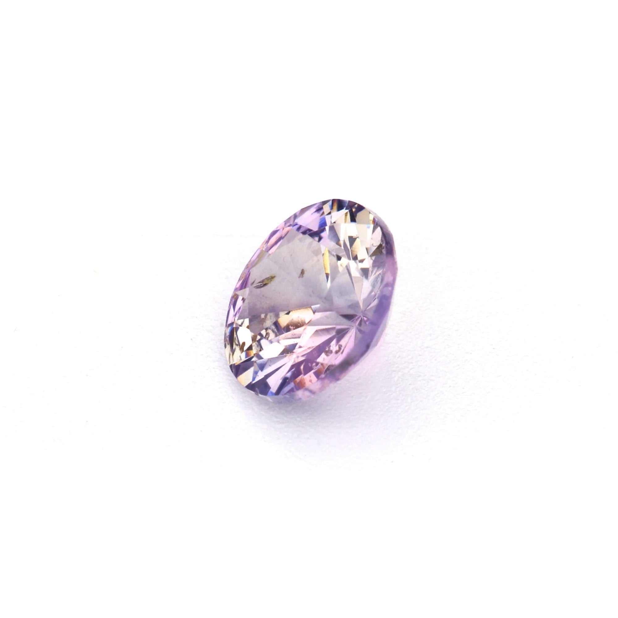 0.34 carat unheated violet sapphire gemstone with rich purple color and excellent clarity