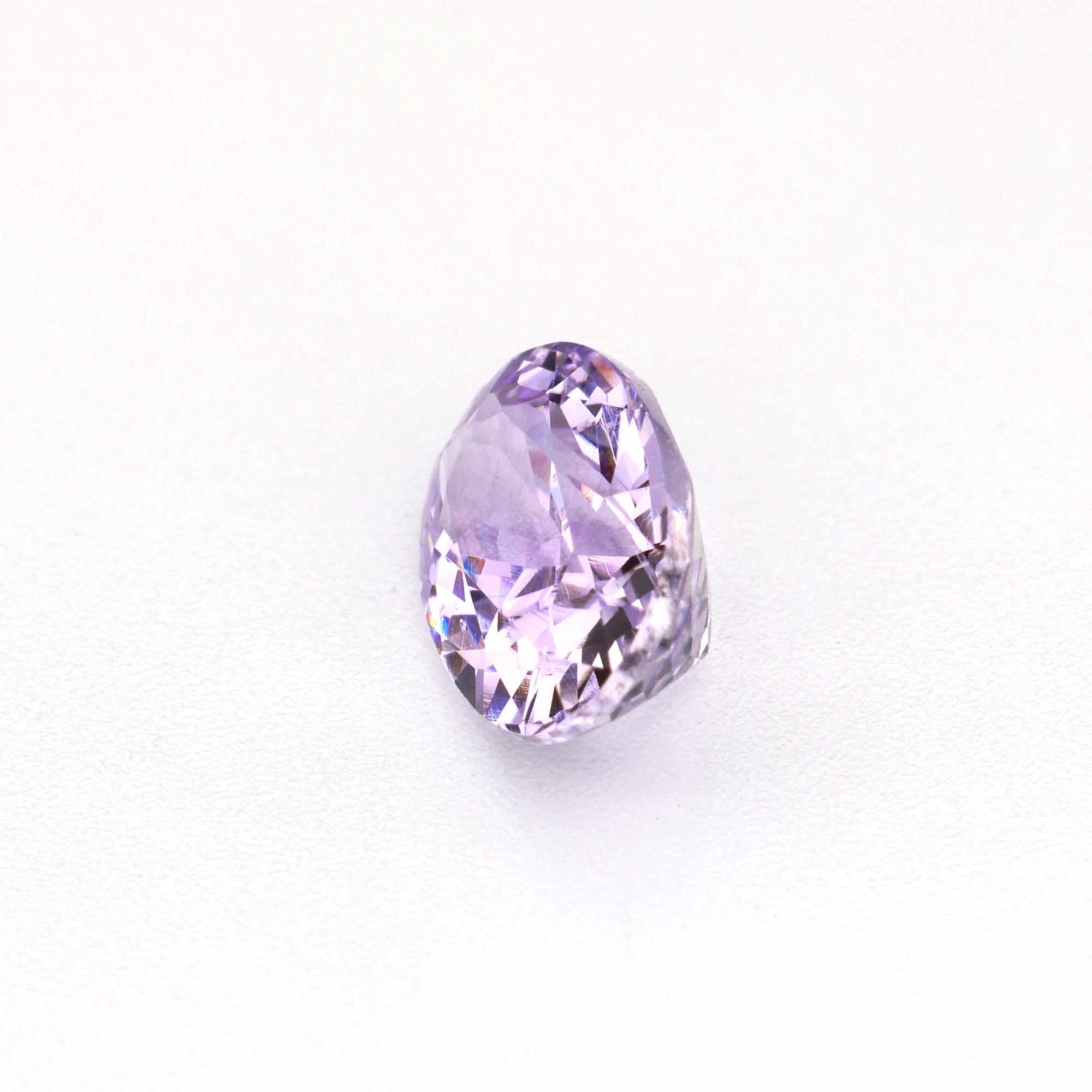 0.60 ct untreated lavender sapphire gemstone with rich purple hue and brilliant clarity