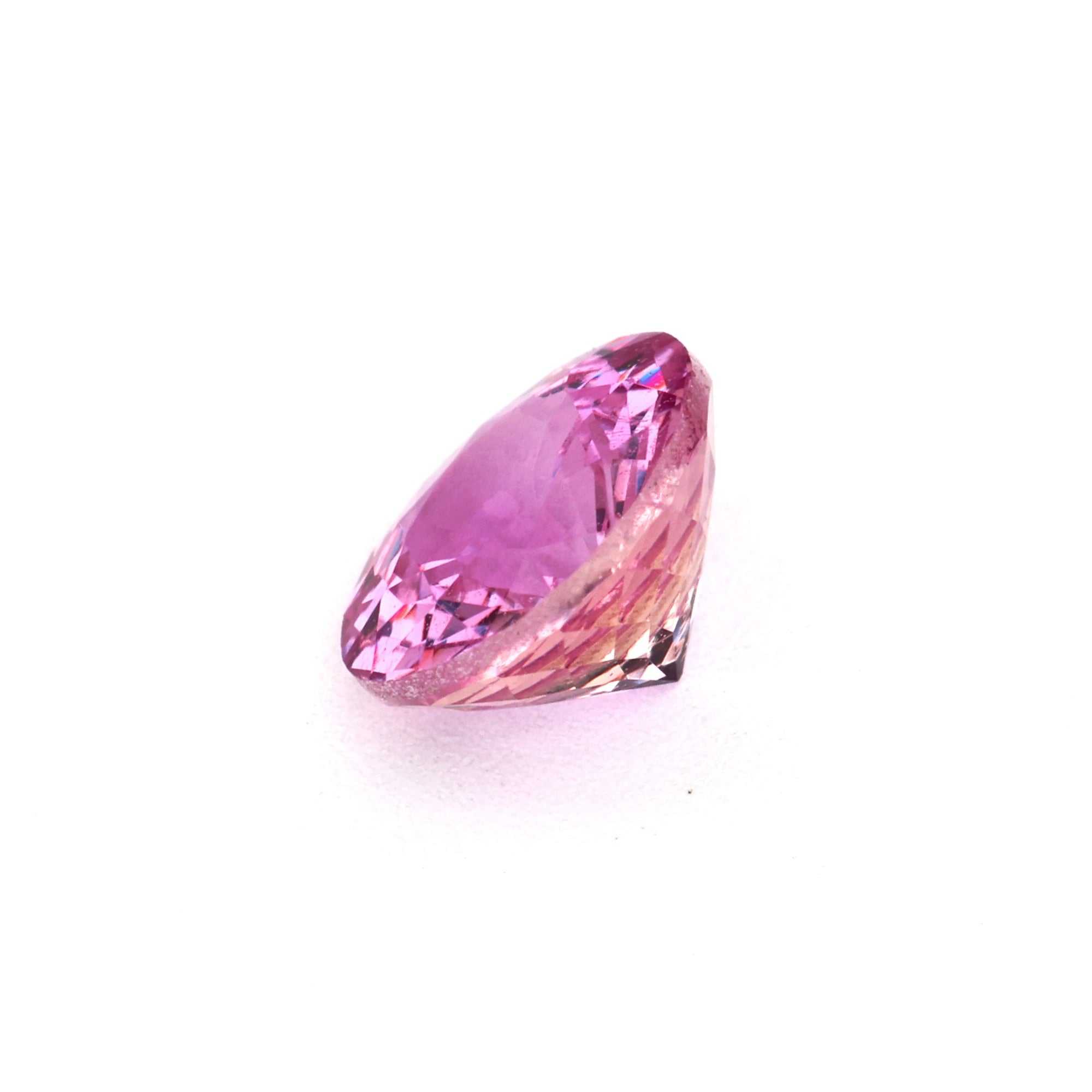 0.62 ct natural pink sapphire gemstone with vibrant pink hue and brilliant cut