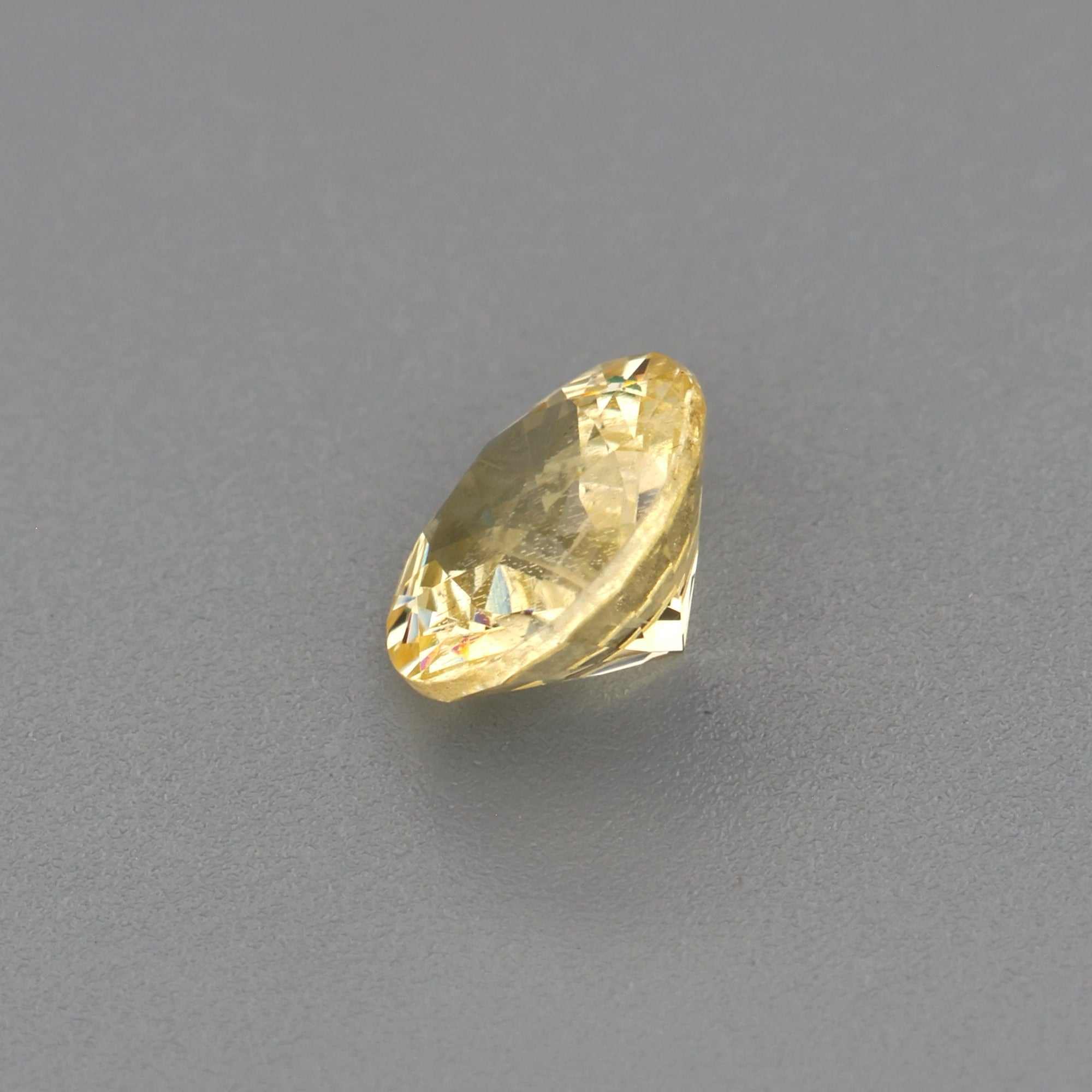 0.43 ct natural untreated yellow sapphire gemstone with vibrant golden hue and excellent clarity