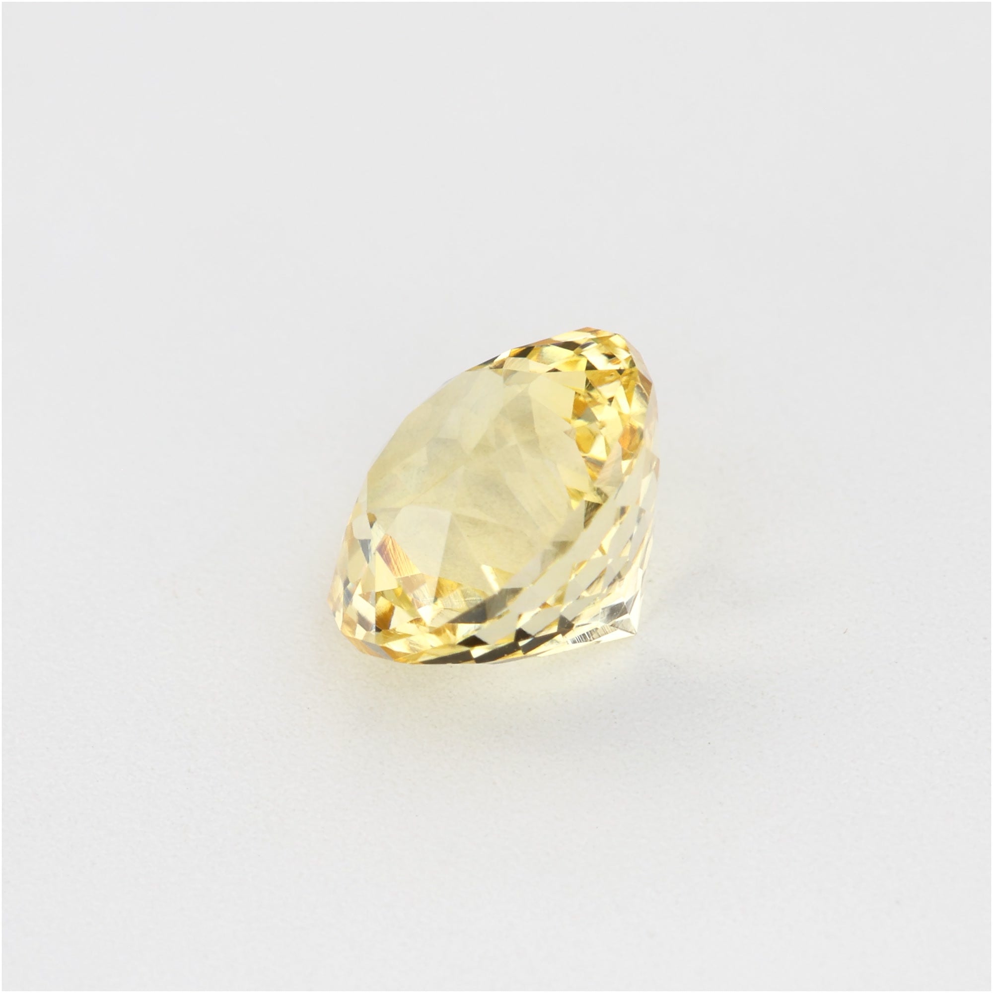 1.07 ct natural untreated yellow sapphire gemstone with golden hue and excellent clarity