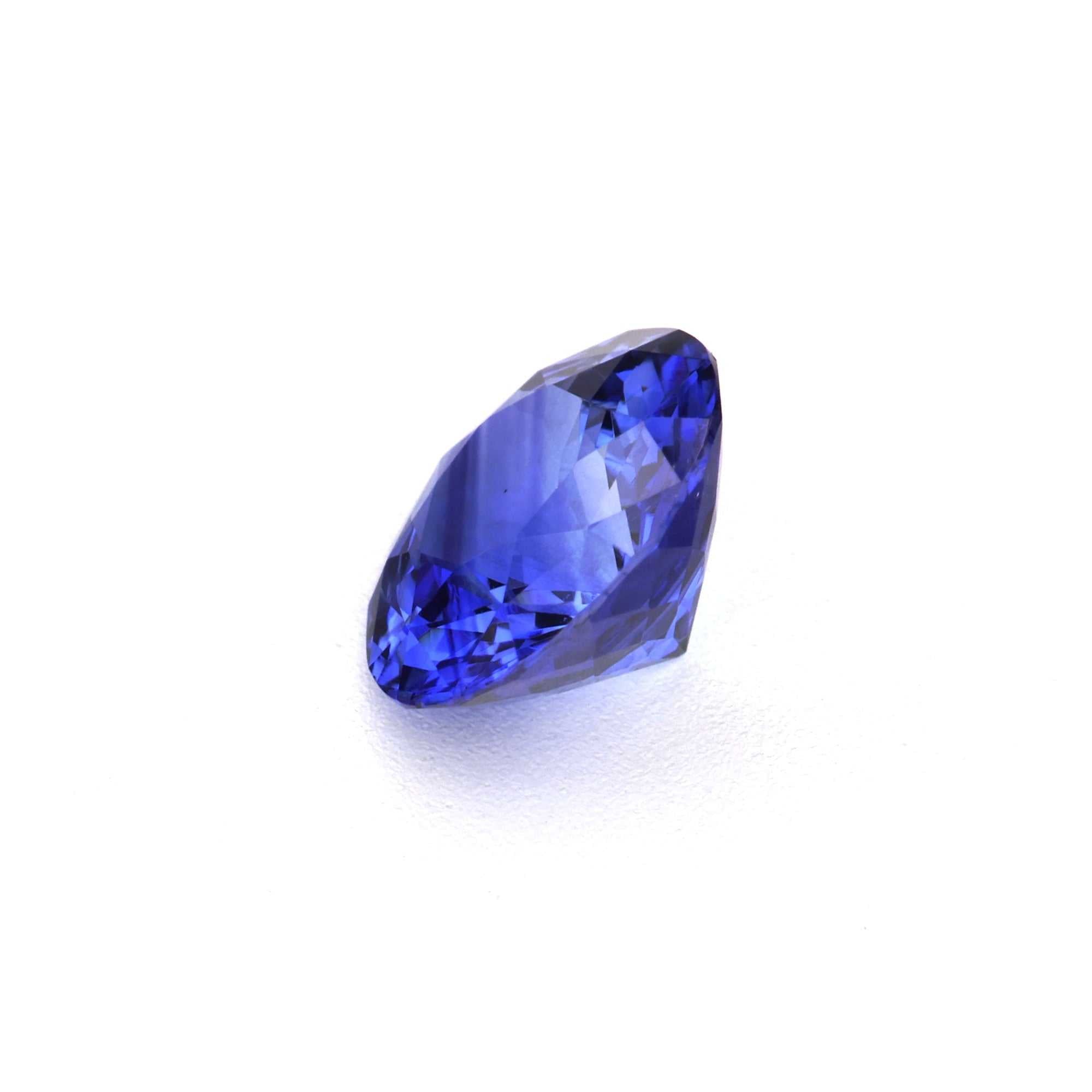 0.87 carat round natural blue sapphire with brilliant cut and deep blue color for fine jewelry
