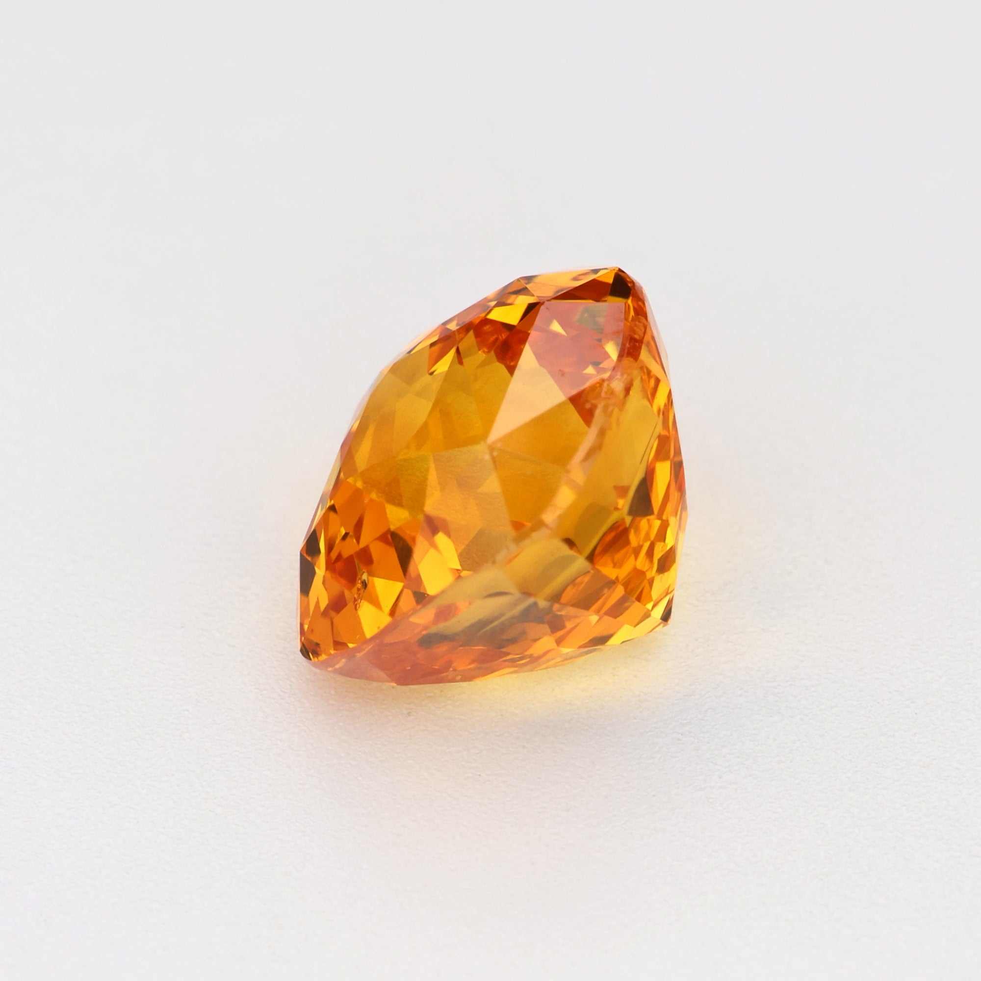 2.19 ct natural orange sapphire gemstone with radiant golden-orange hues and exceptional clarity