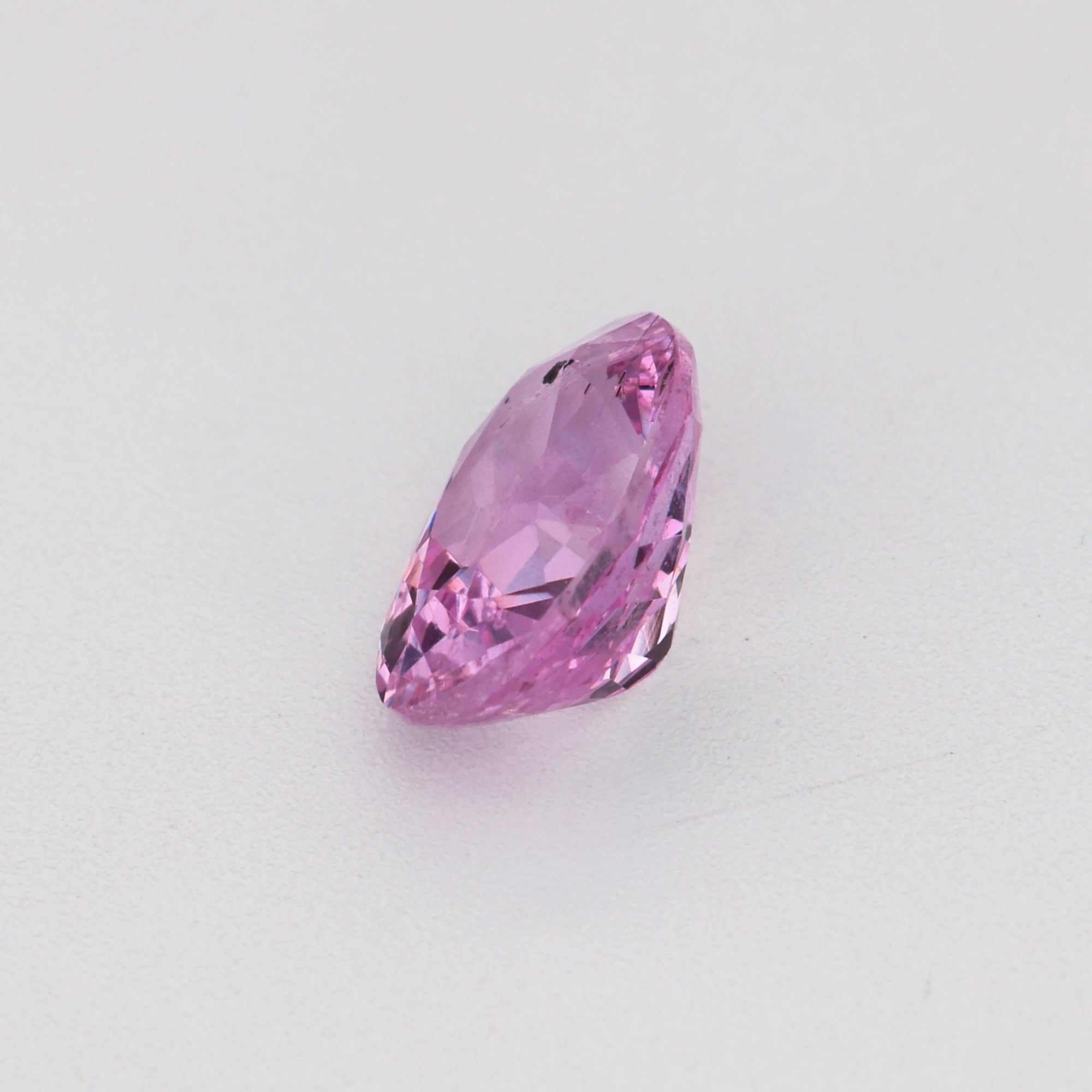 0.57 ct natural unheated pink sapphire gemstone with soft pink hue and excellent clarity
