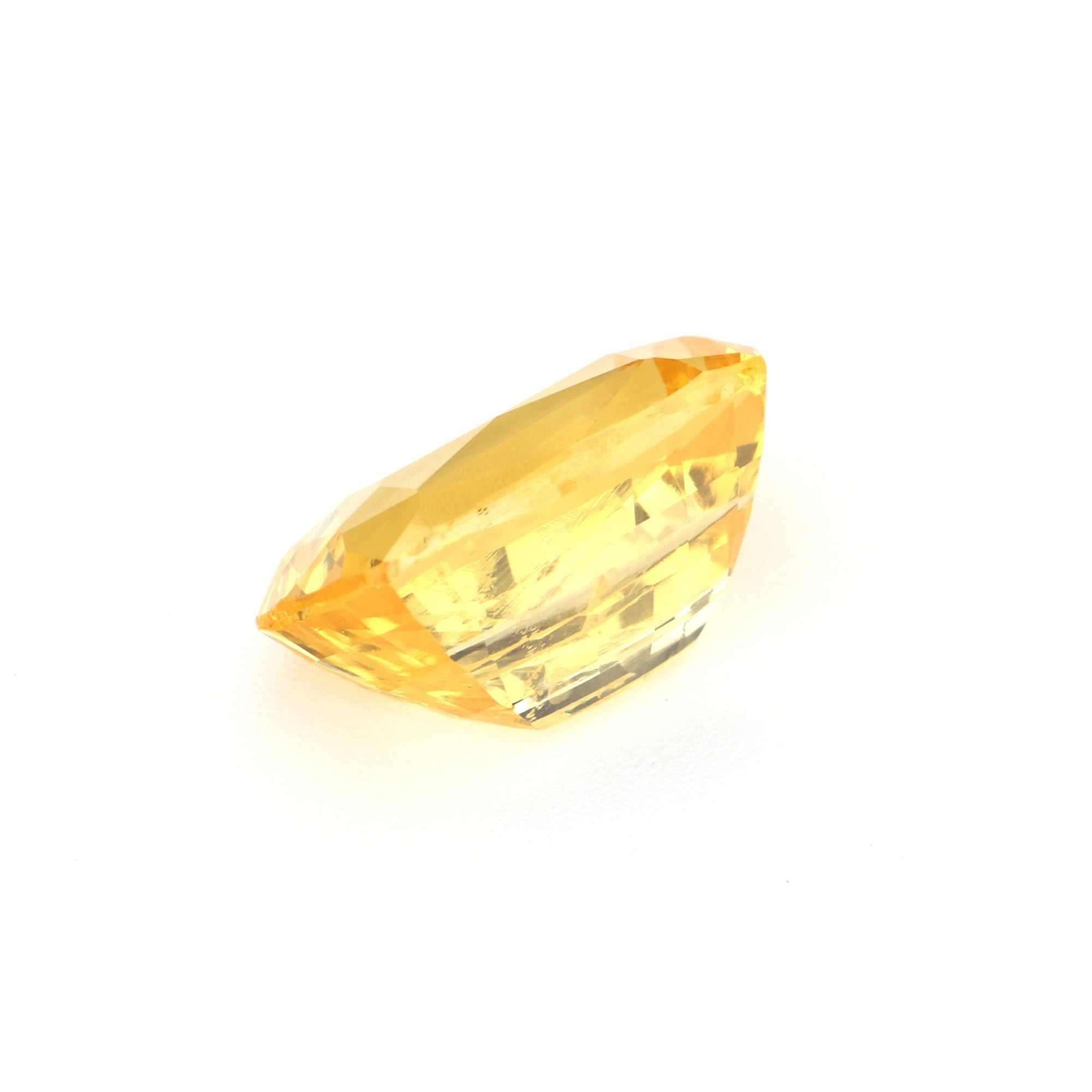 2.175 ct Cushion Yellow Sapphire, unheated, showcasing its golden yellow hue and cushion cut brilliance.
