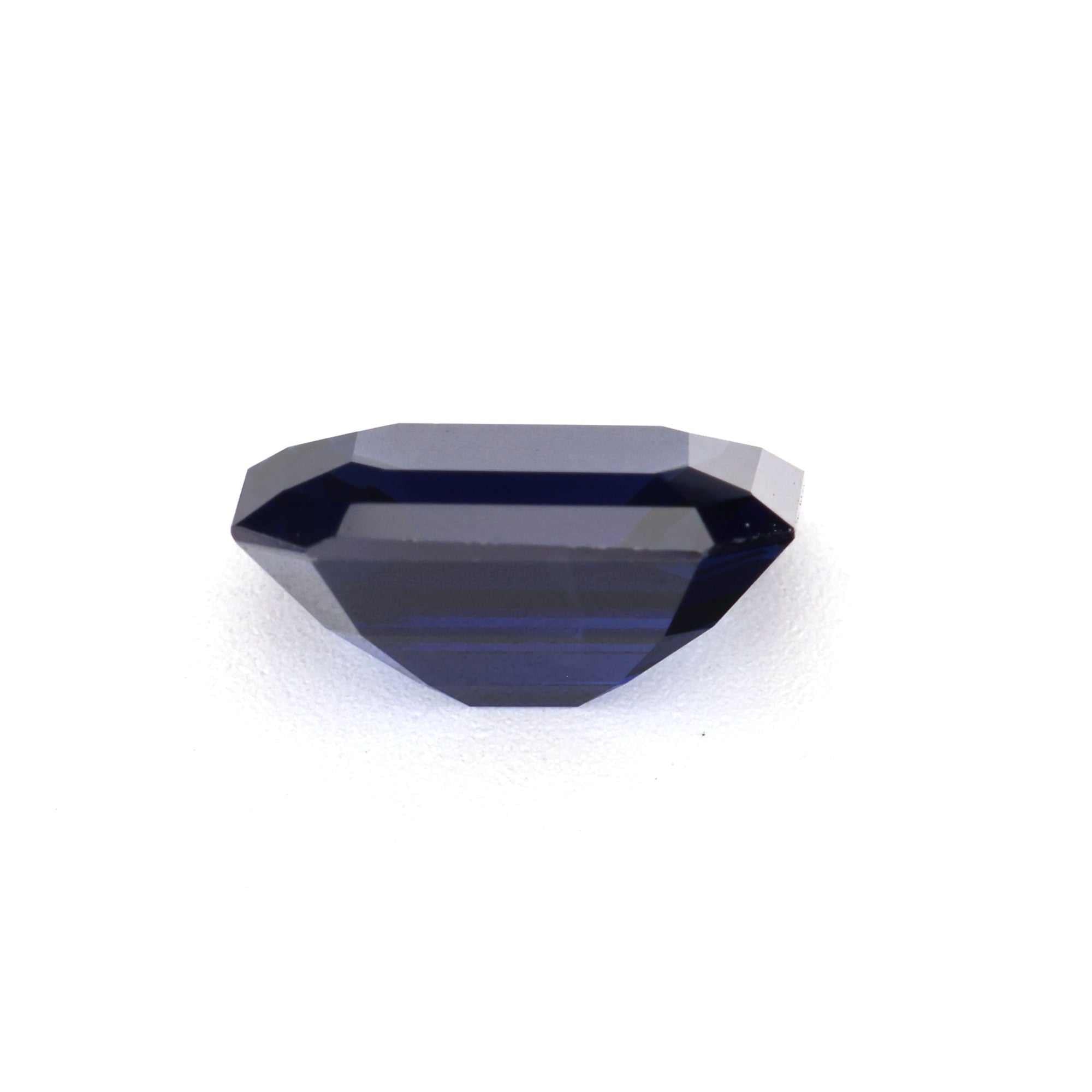 1.32 carat deep dark blue sapphire gemstone with excellent clarity and brilliant cut