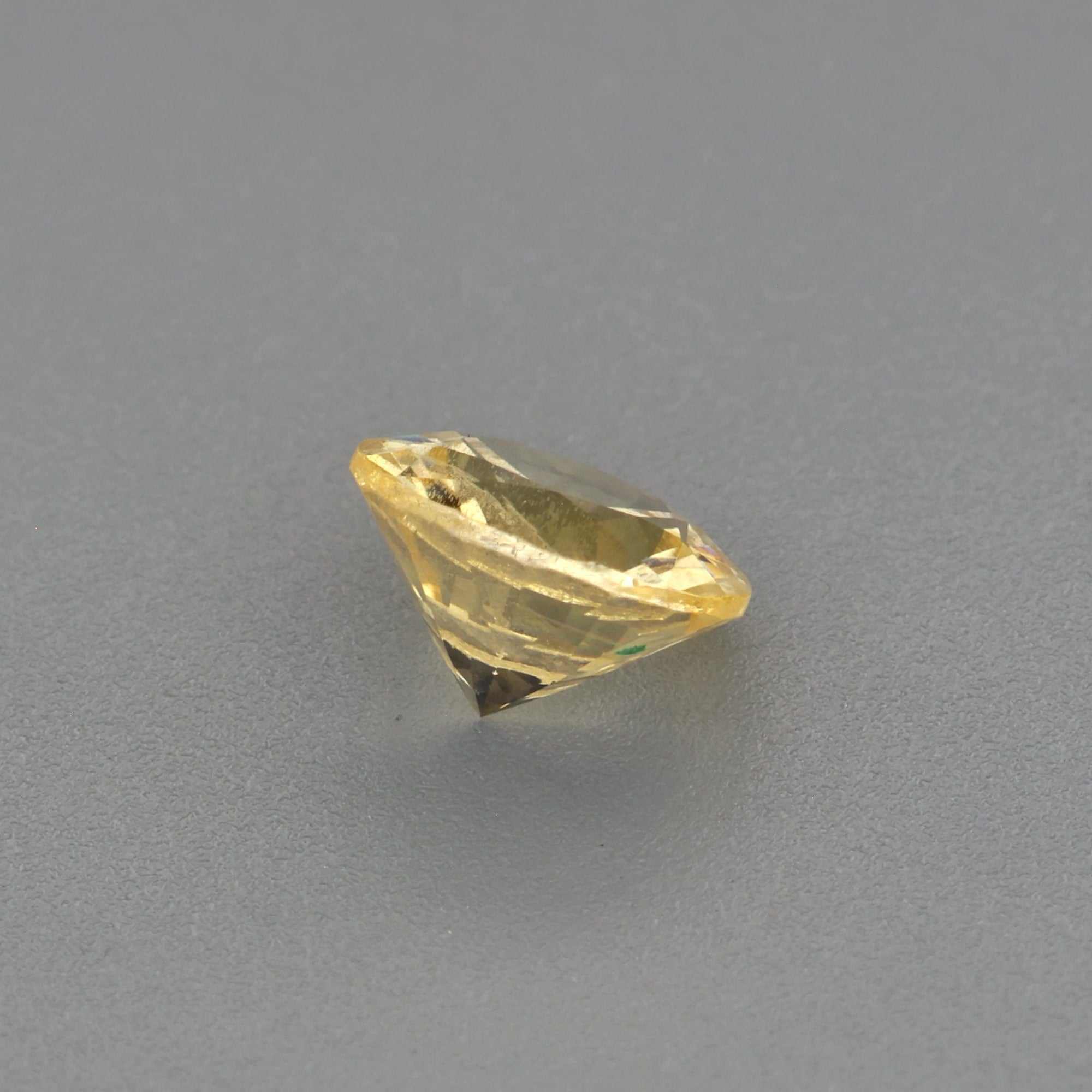 0.43 ct natural unheated yellow sapphire gemstone with radiant golden hue and excellent clarity