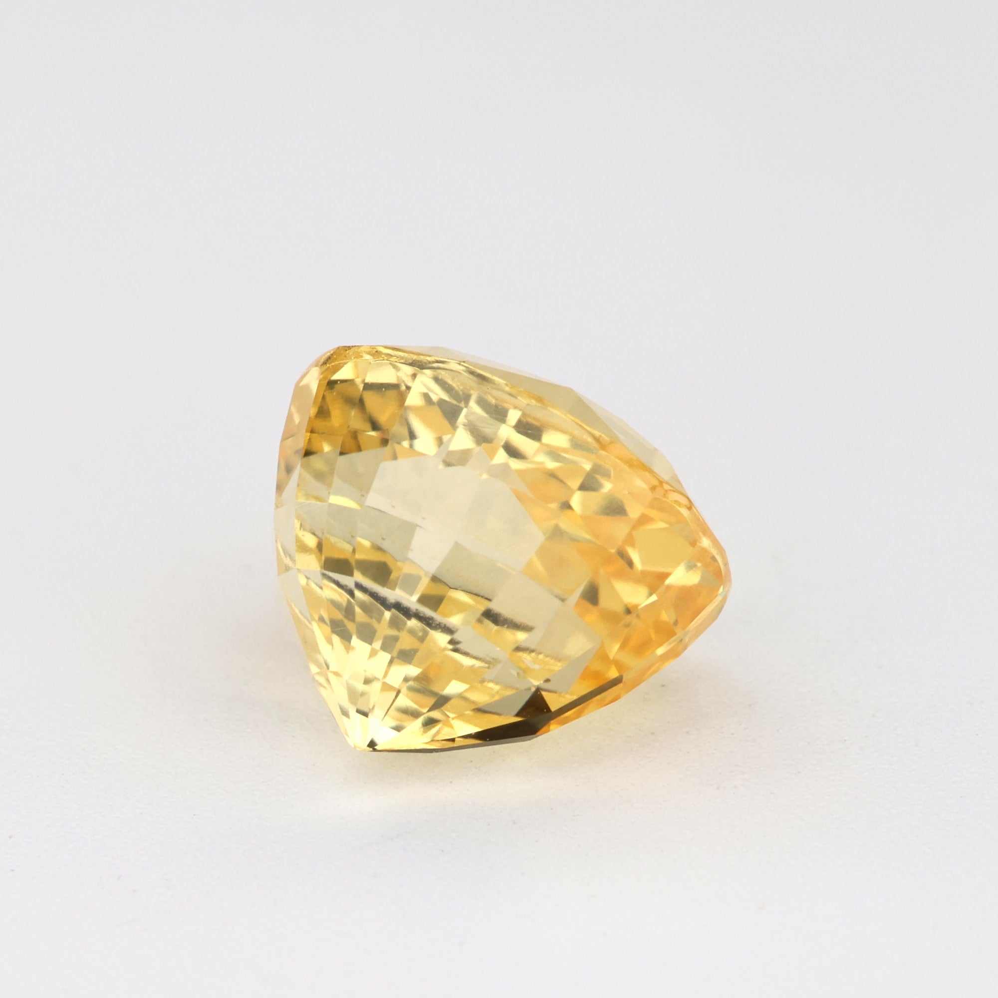 2.10 ct untreated yellow sapphire gemstone with natural golden hue and excellent clarity