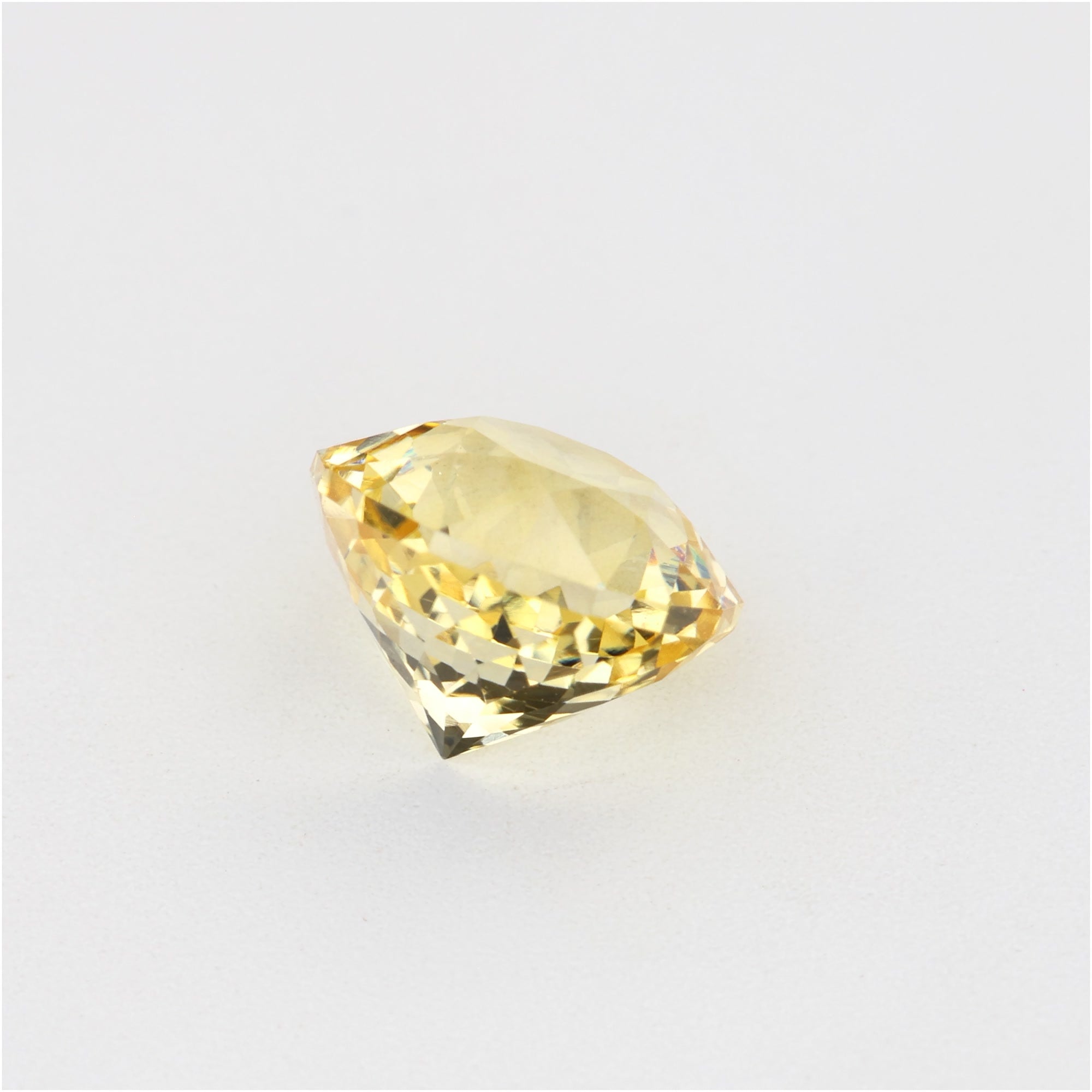 1.07 ct natural untreated yellow sapphire gemstone with excellent clarity and soft golden hue