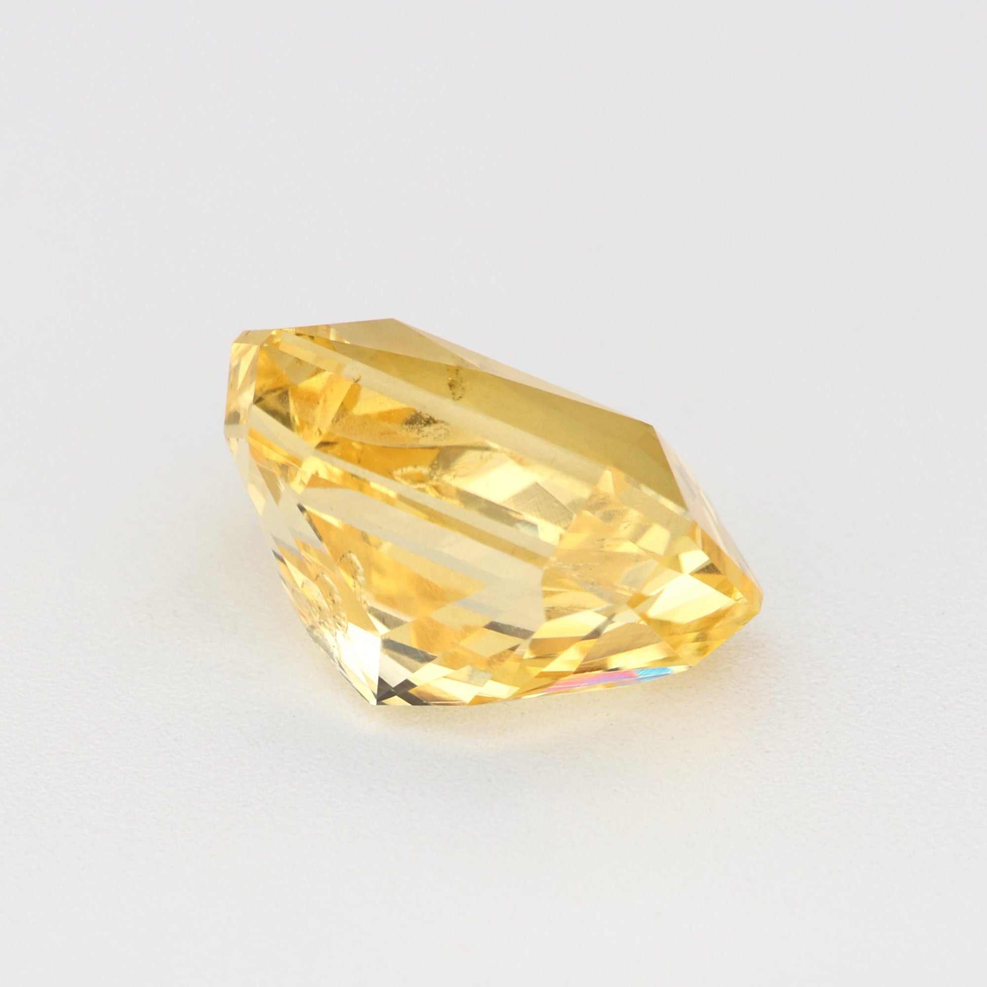 1.82 ct natural untreated yellow sapphire gemstone with vivid golden hue and excellent clarity