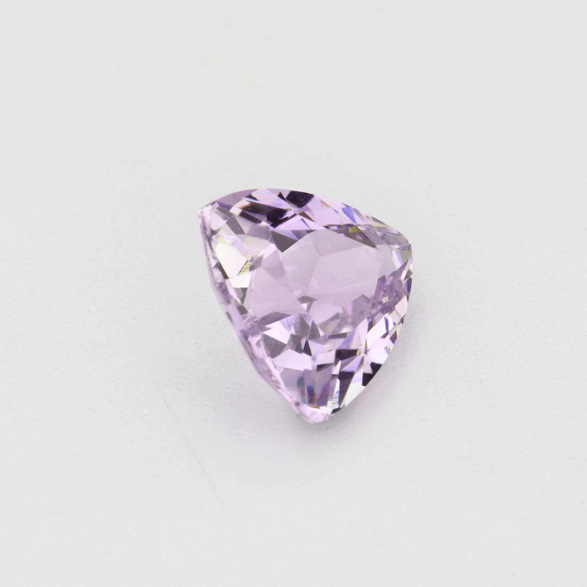 0.58 ct natural unheated violet sapphire gemstone with precision cut and excellent clarity
