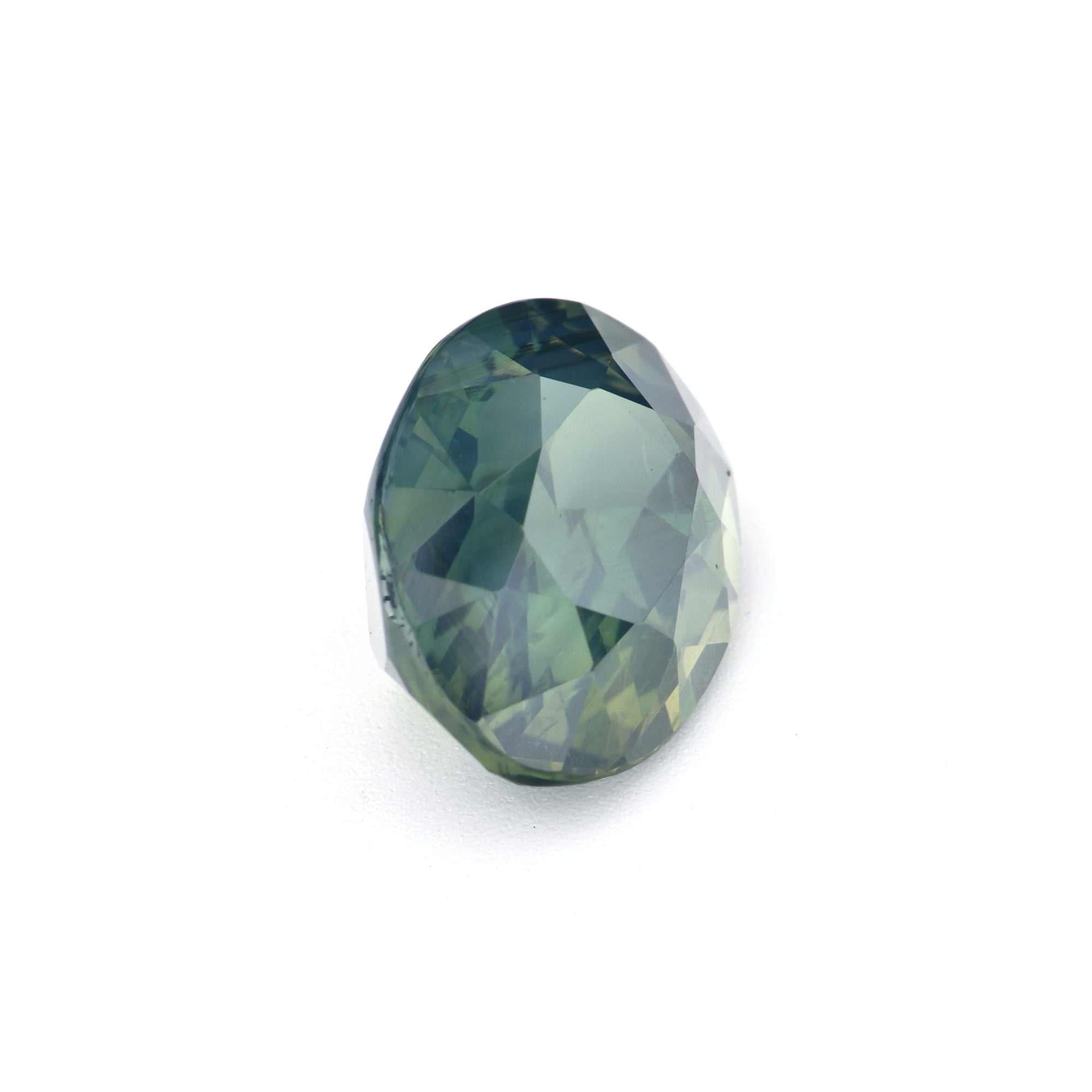 3.26 ct olive green sapphire gemstone with excellent clarity and brilliant cut