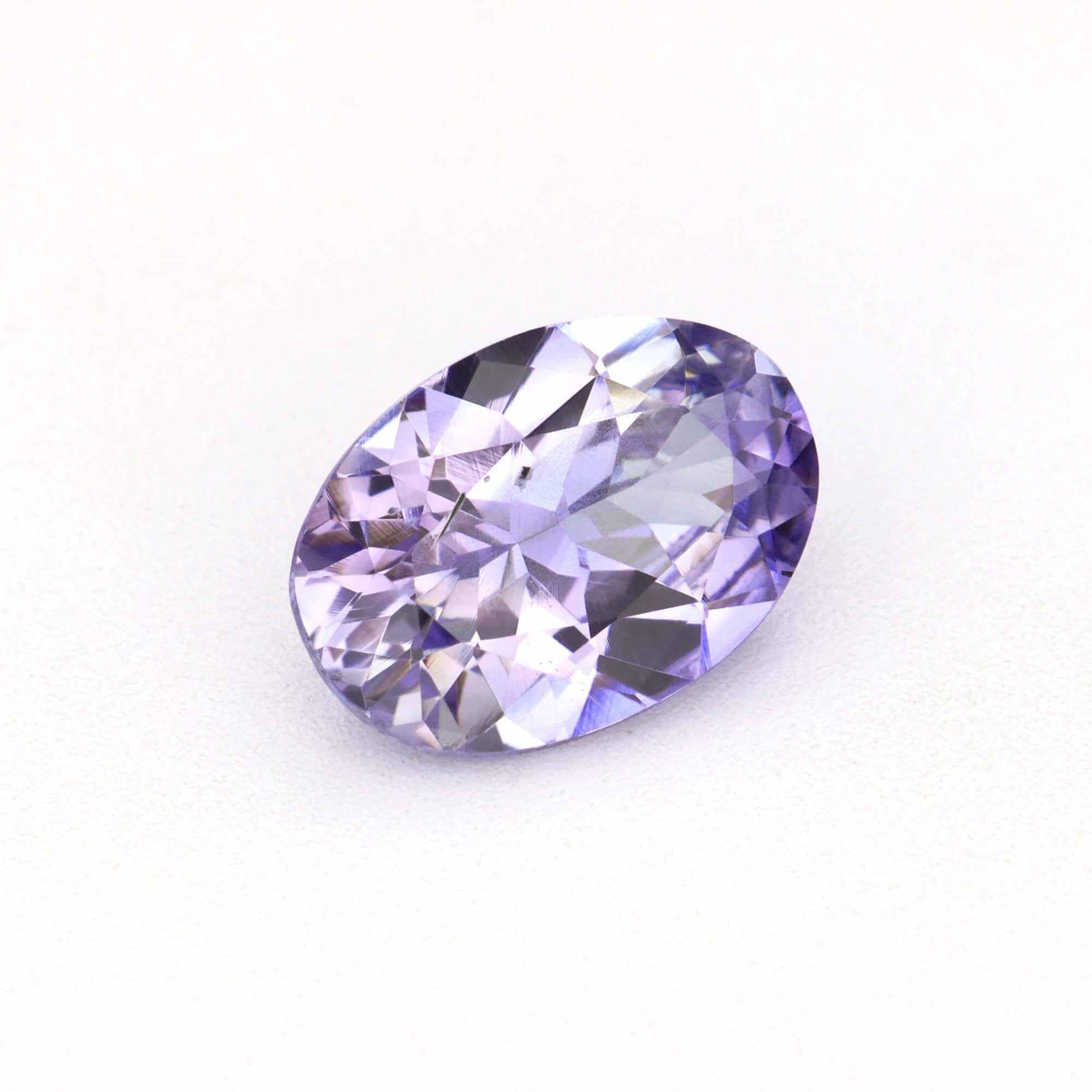 0.83 ct Oval Violet Sapphire, natural unheated gemstone with rich lavender-violet color.