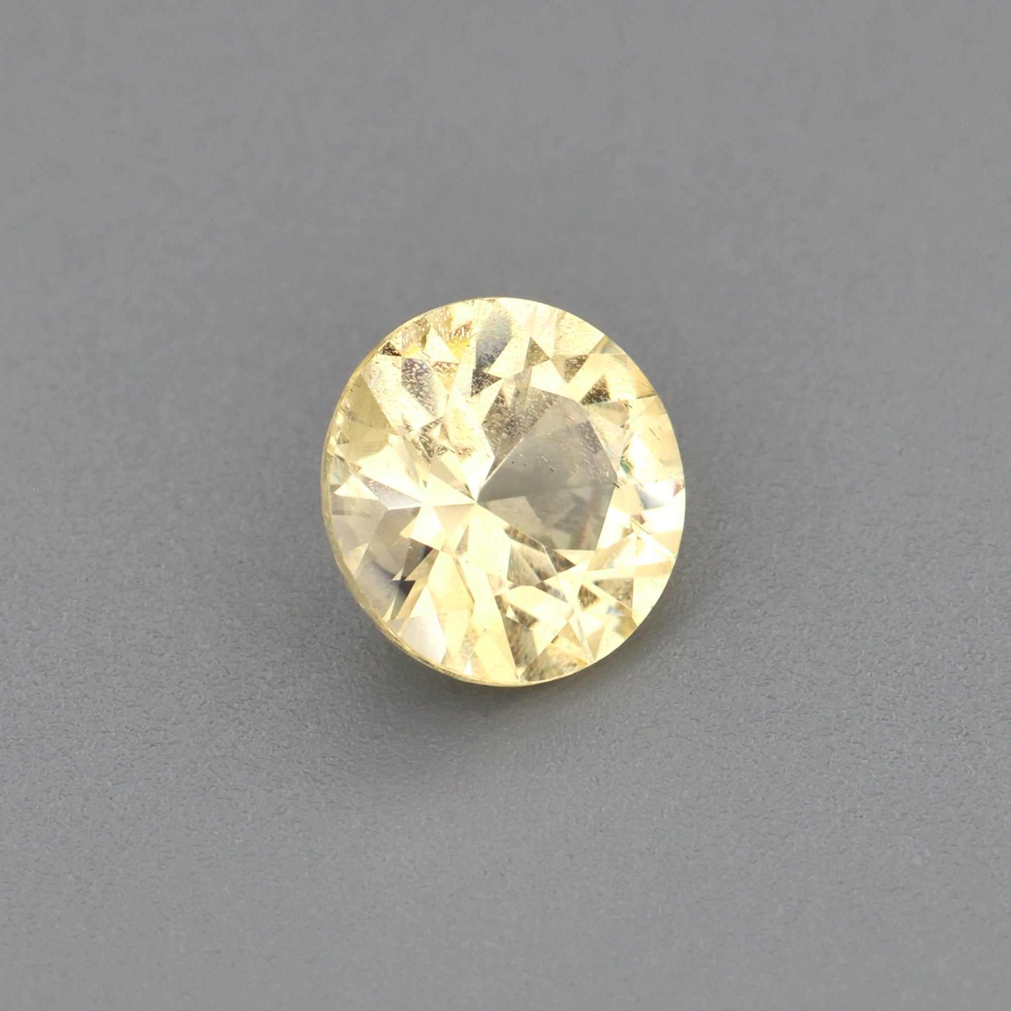 0.43 ct natural unheated yellow sapphire gemstone with golden hue and excellent clarity