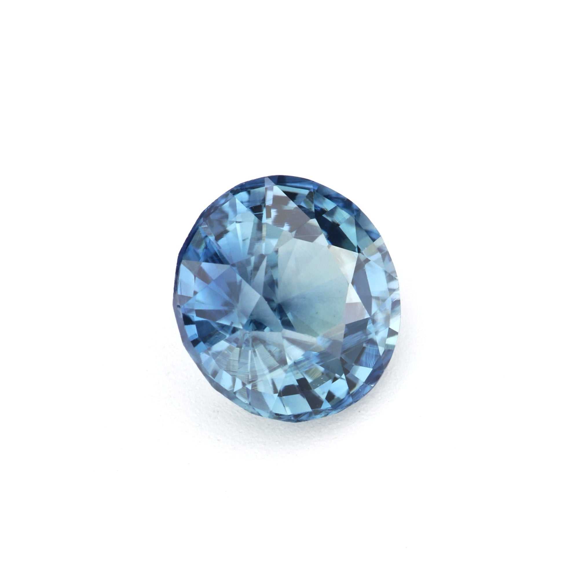 1.08 ct unheated teal sapphire gemstone with excellent clarity and brilliant cut showcasing natural blue-green hues