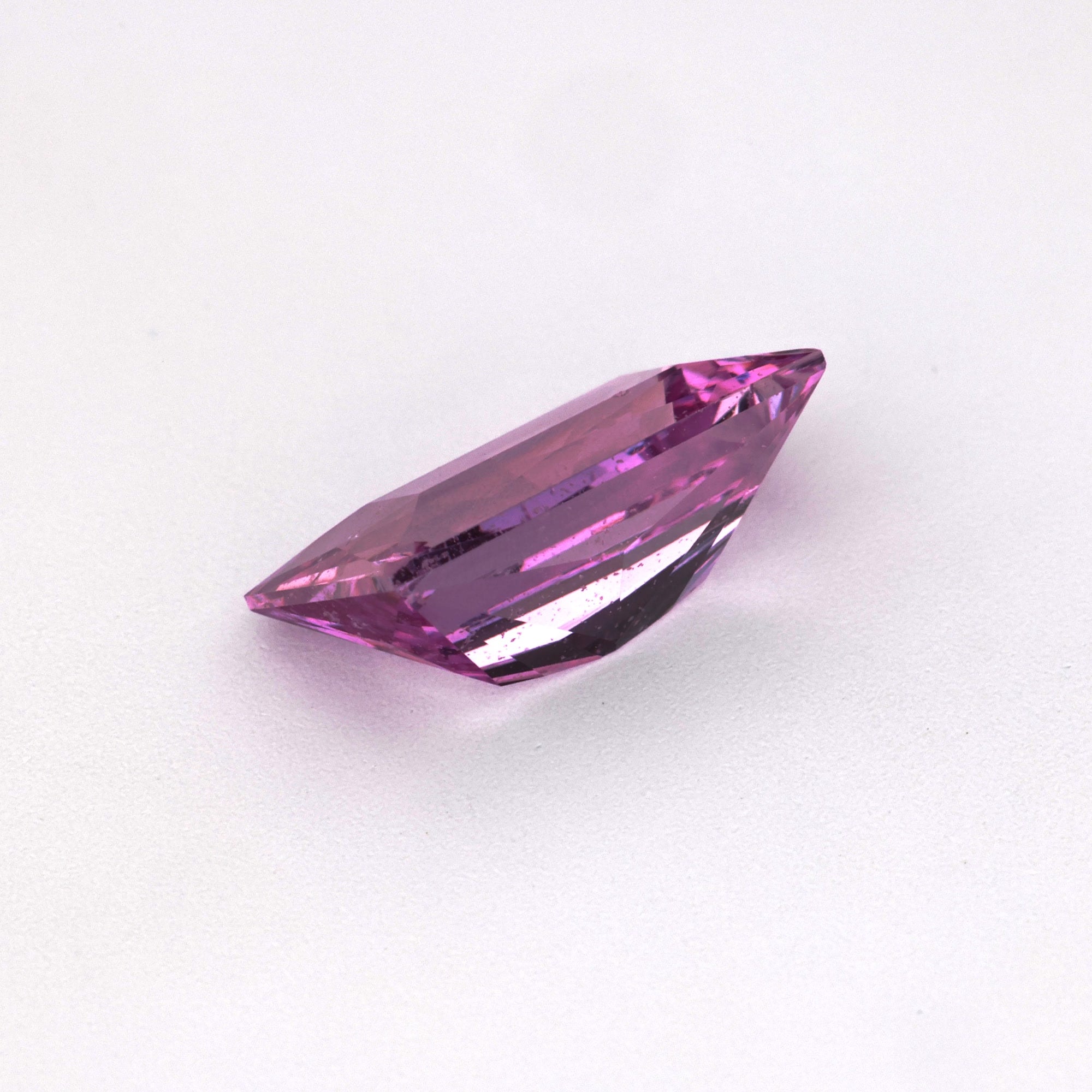 1.45 ct Radiant Cut Pink Sapphire showing elongated rectangular silhouette and faceting
