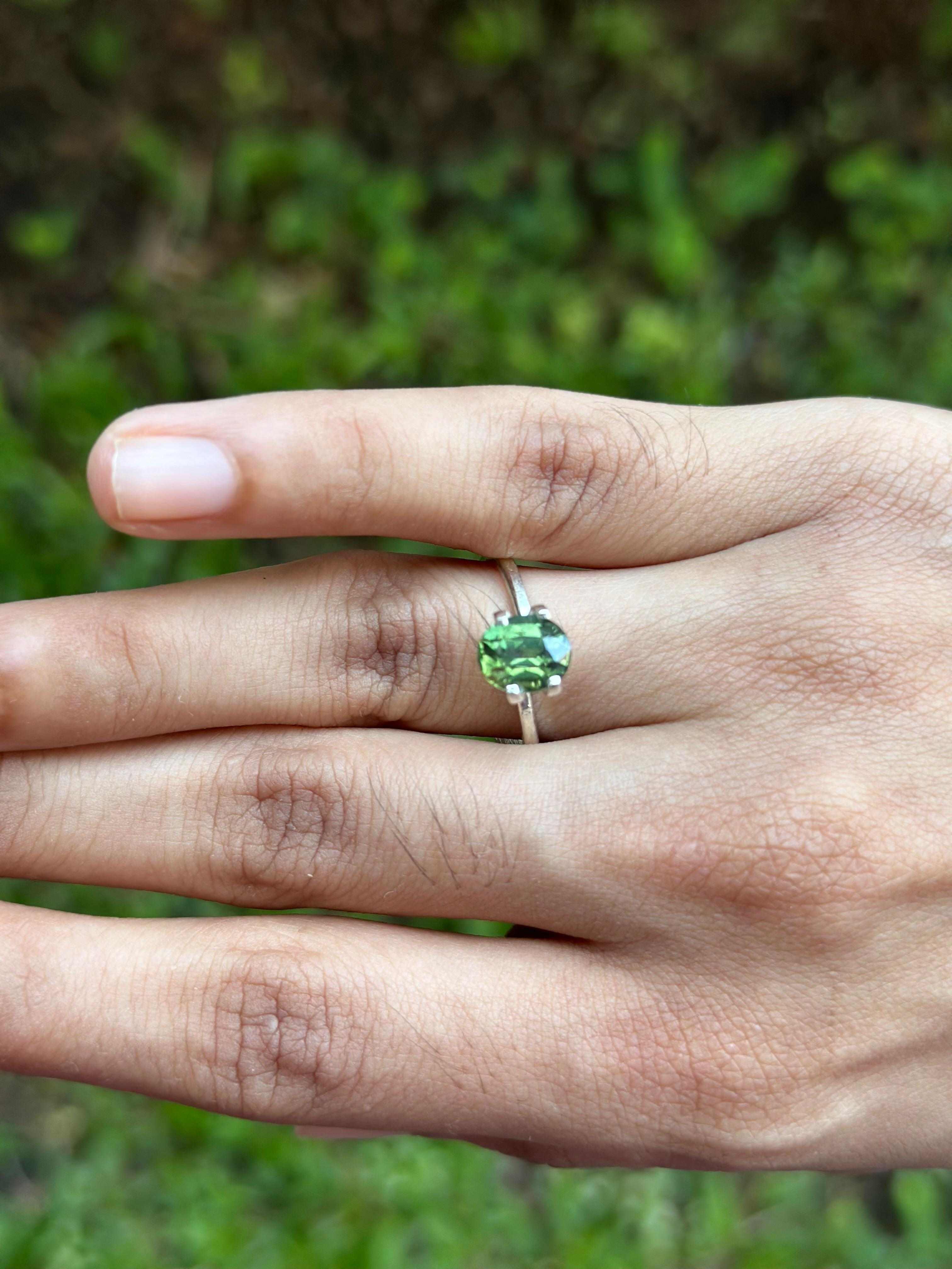 2.086 ct oval green sapphire gemstone with excellent clarity and brilliance from Tanzania