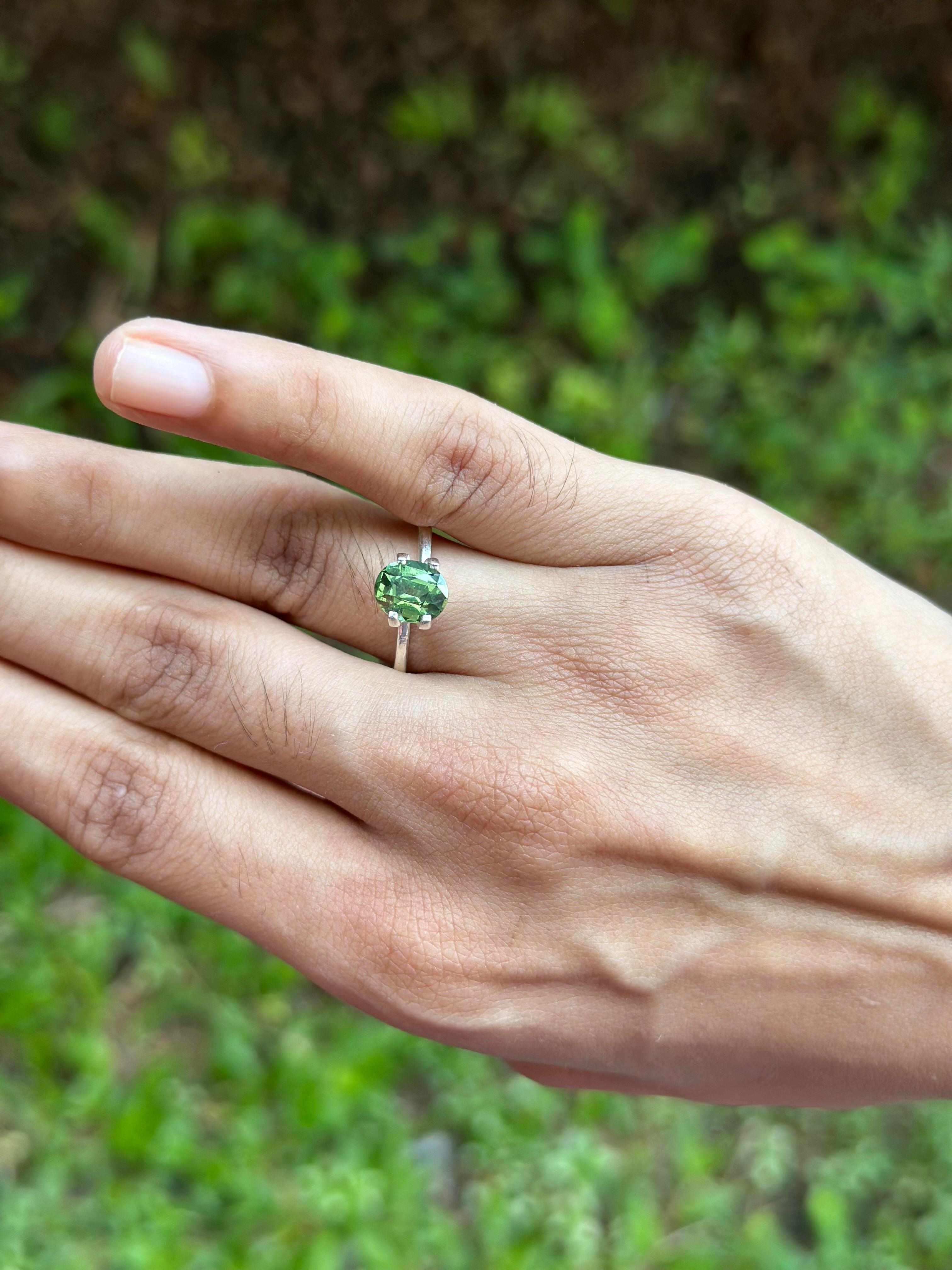 2.086 ct oval green sapphire gemstone with brilliant clarity and rich calming green hue from Tanzania
