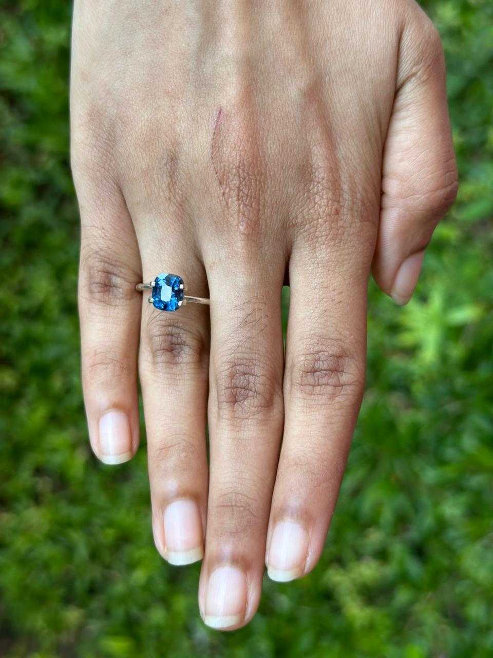 Deep blue unheated sapphire gemstone with brilliant clarity and rich color