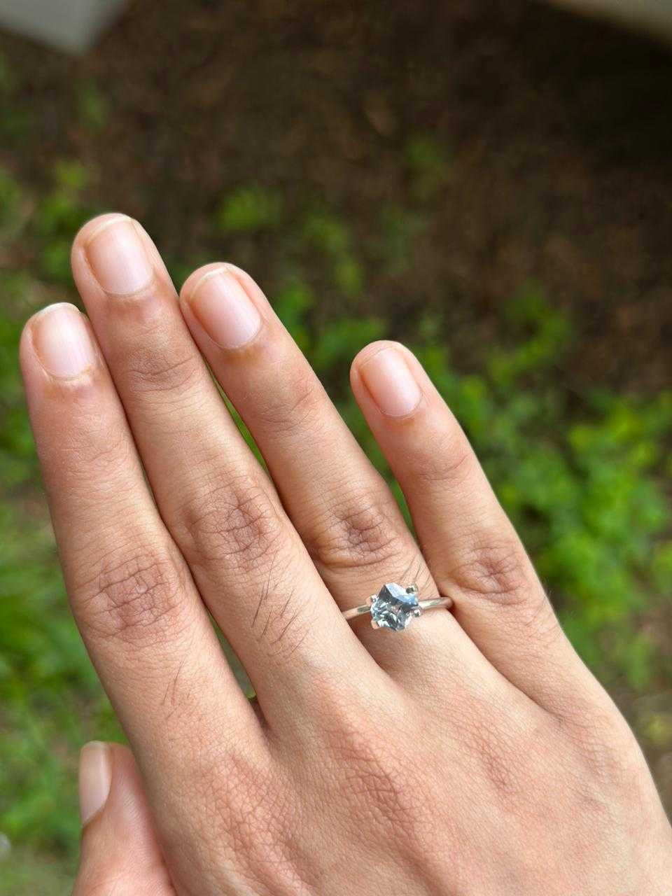 1.29 ct unheated teal green sapphire with square octagon cut and brilliant sparkle