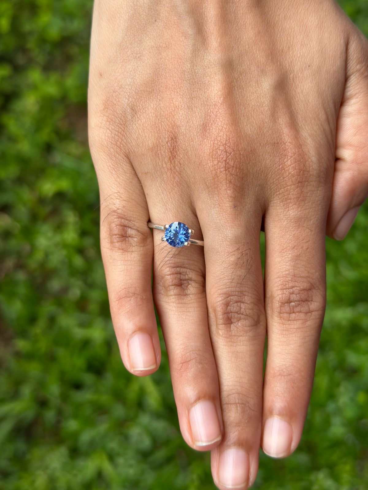 1.62 Ct round-cut deep blue sapphire gemstone with excellent clarity and brilliance for fine jewelry