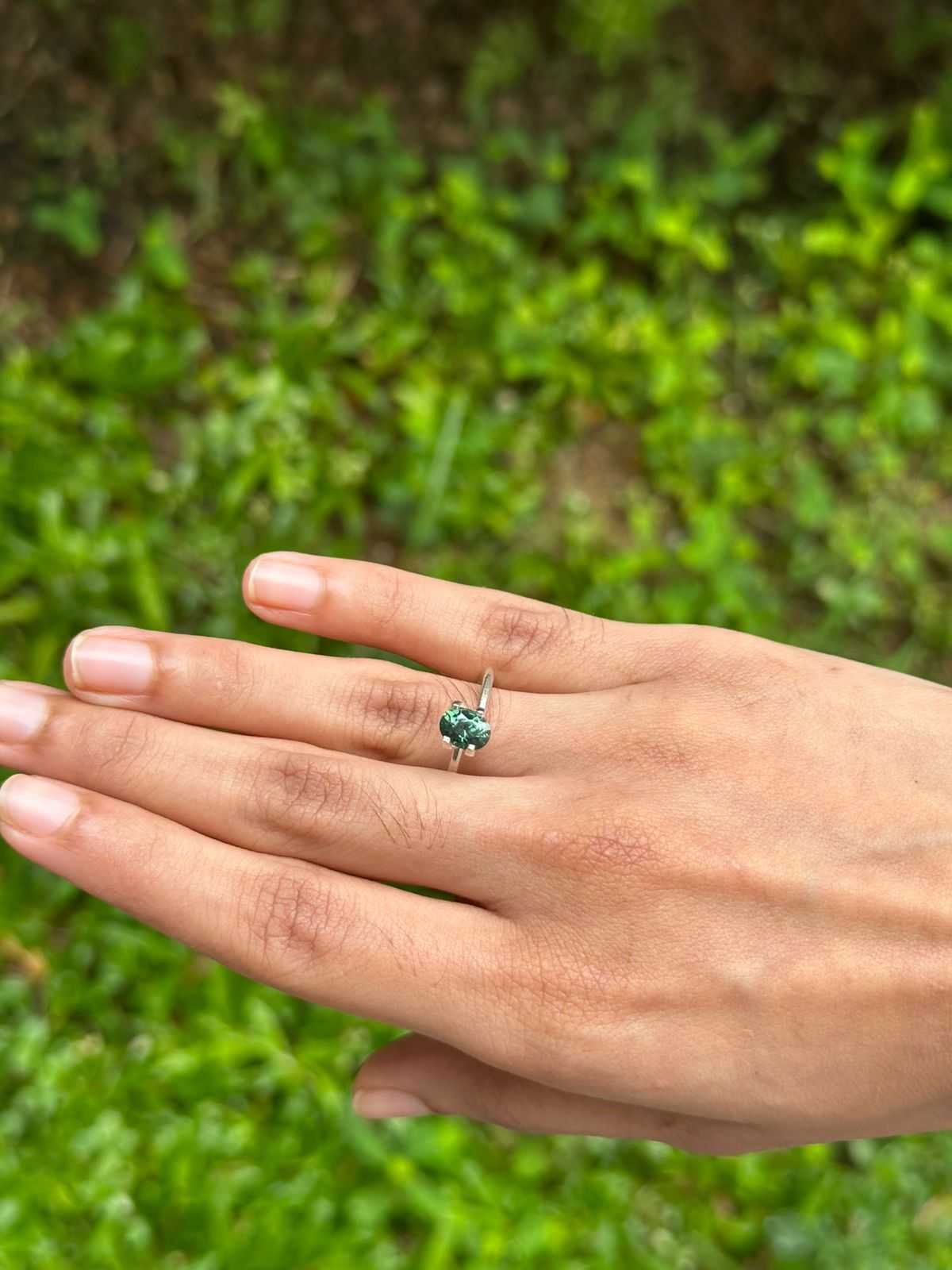 1.24ct unheated natural green sapphire gemstone with excellent clarity and brilliant cut
