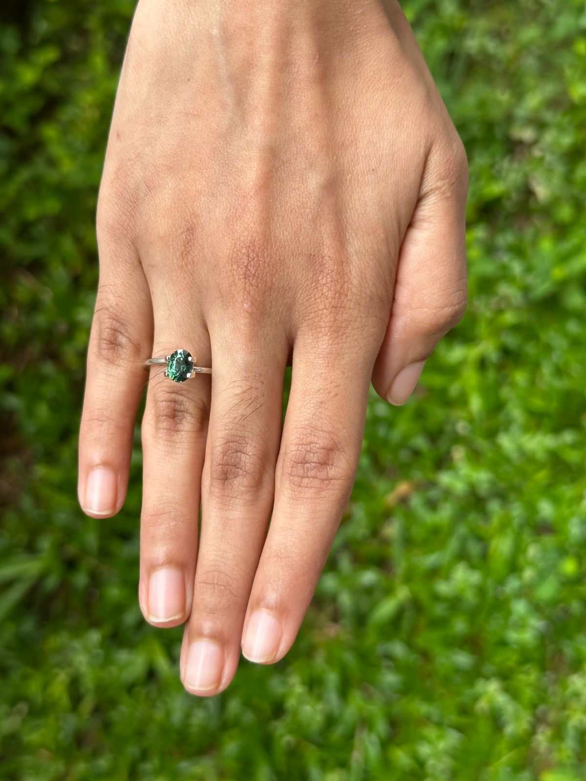 1.24ct natural unheated green sapphire gemstone with excellent clarity and brilliance