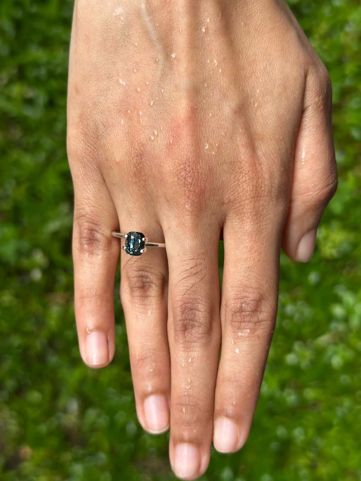 2.01 ct unheated teal sapphire gemstone with brilliant clarity and blue-green color change