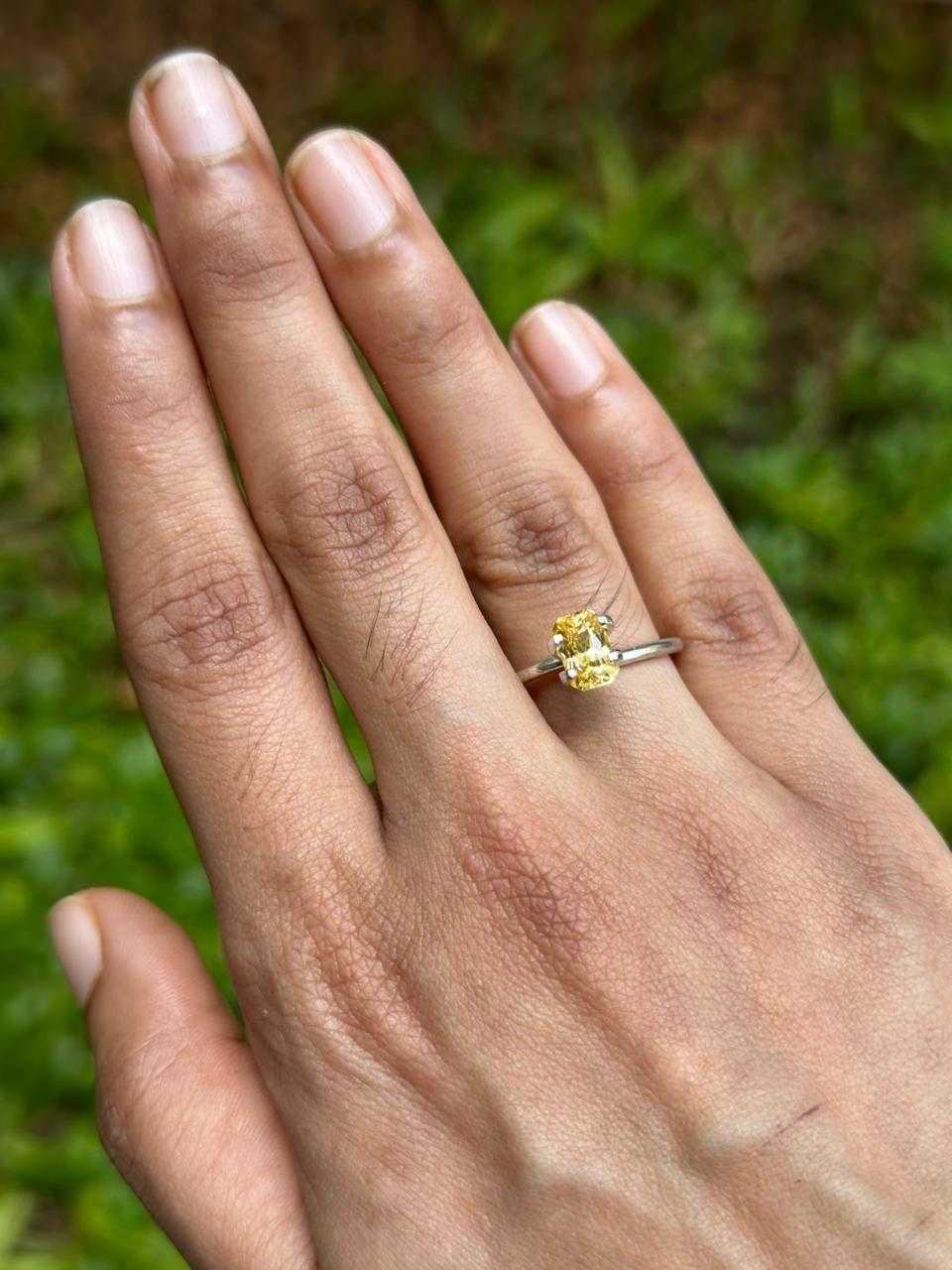 1.82 ct natural untreated vivid yellow sapphire gemstone with excellent clarity and golden hue