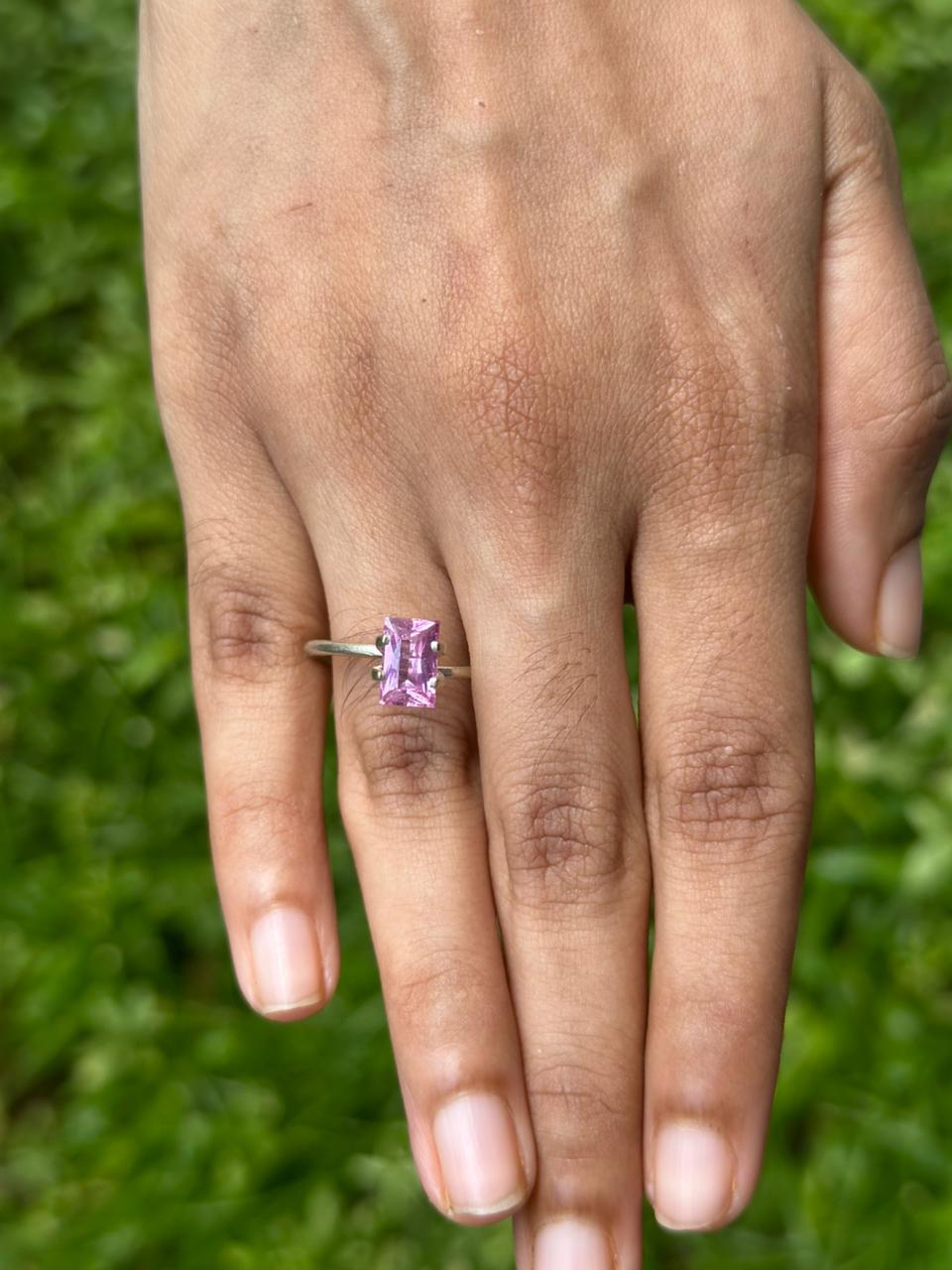 1.45 ct natural unheated Radiant Cut Pink Sapphire on display showing pink hue