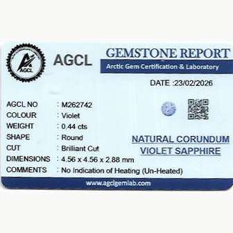 Close-up of a 0.44 ct unheated violet sapphire gemstone with rich purple color and excellent clarity