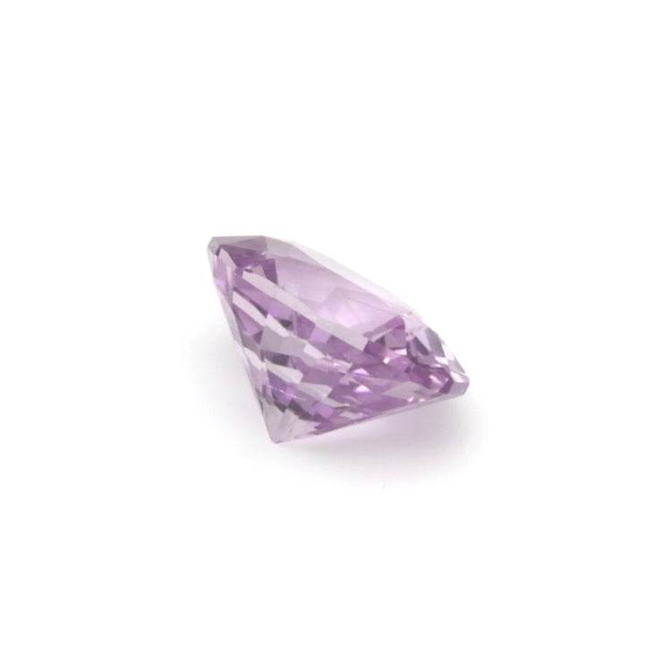 1.02 ct oval cut pink sapphire gemstone with brilliant mixed cut facets and pale pink hue