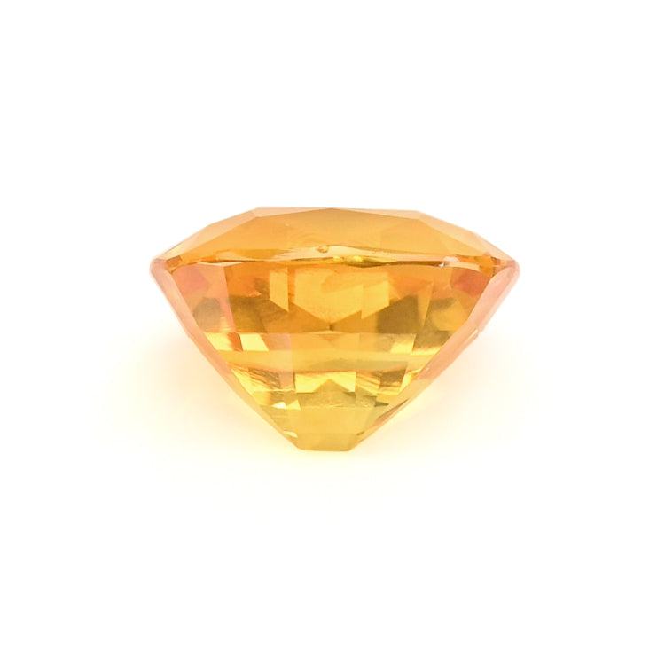 1.13 ct yellow sapphire cushion cut with golden orangish-yellow hue and excellent clarity