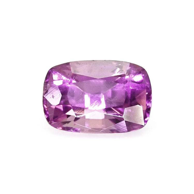 Close-up image of a 1.05 ct cushion-cut pink sapphire gemstone with brilliant pink hue and excellent clarity