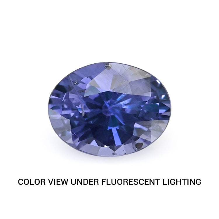 1.17ct unheated Ceylon color change sapphire displaying violet hue and brilliant oval cut